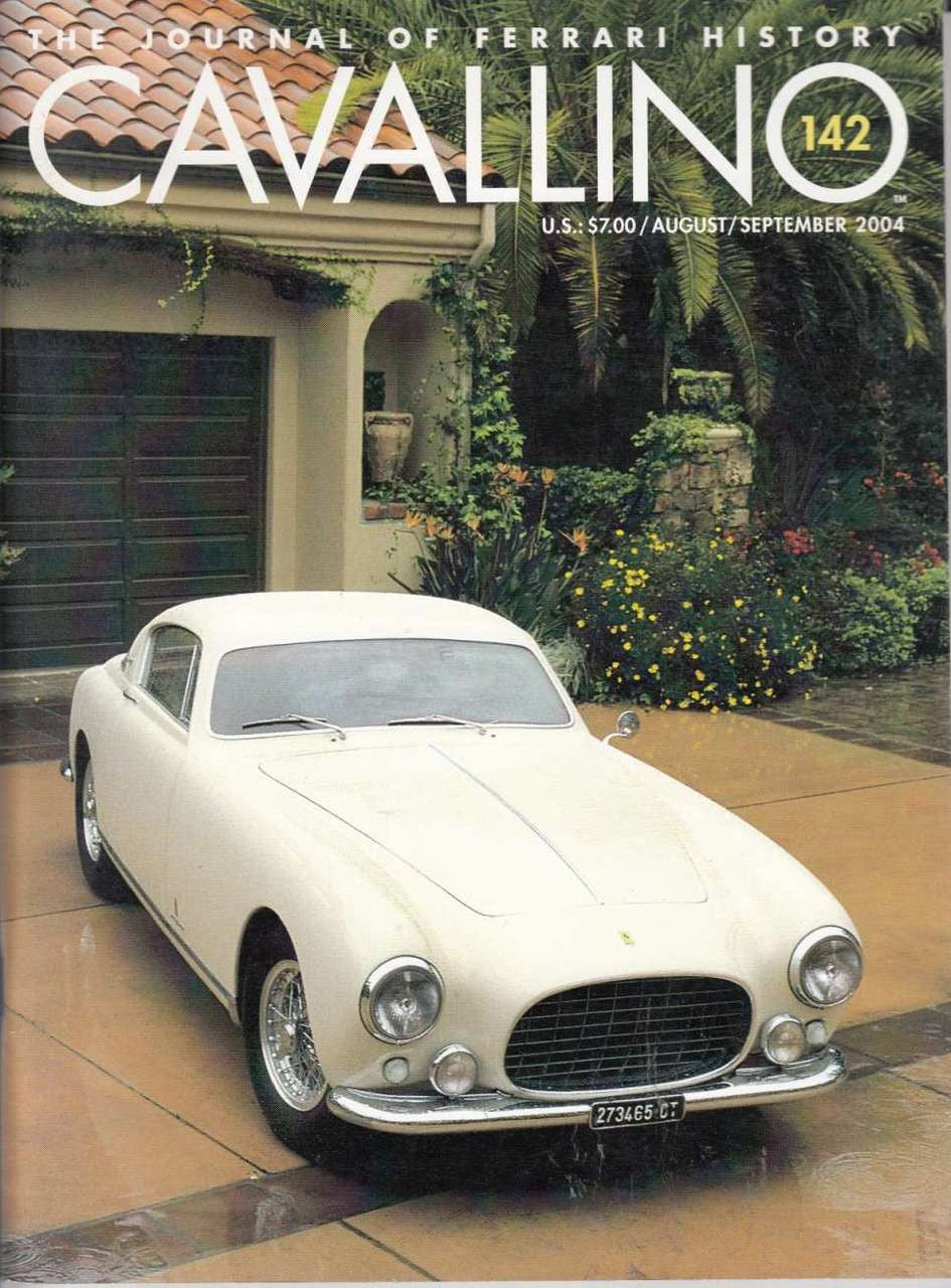 Car history magazine cover with cream coupe and greenery scene