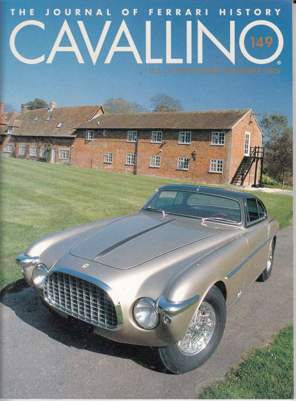 Cavallino magazine issue with Ferrari 149 cover and classic gray sports car front view