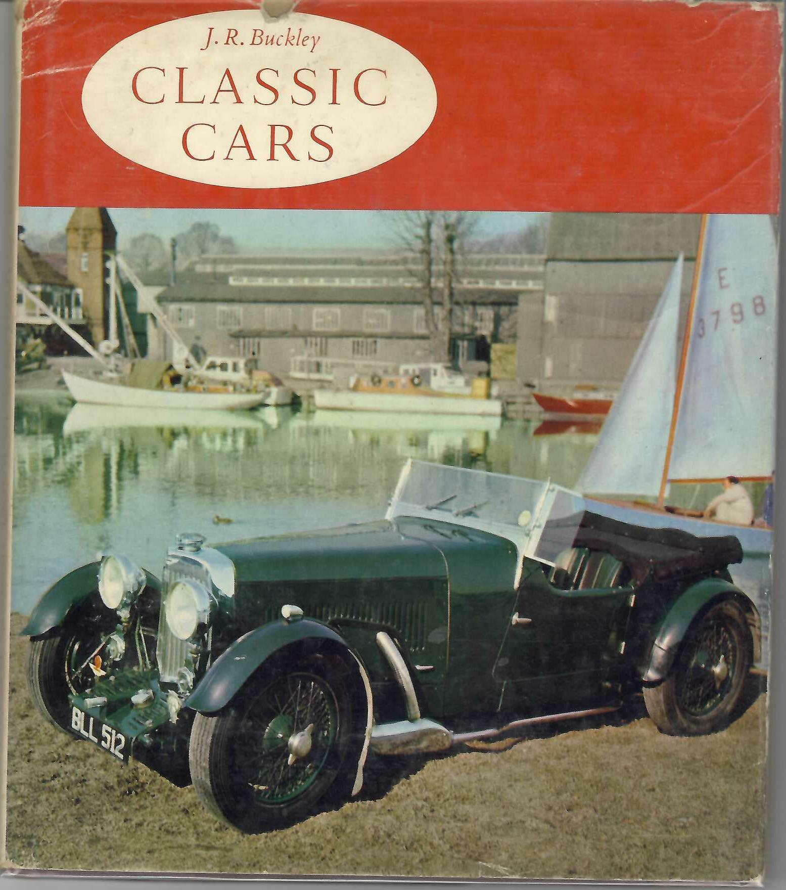 Classic car photo book cover with red background, oval title, and vintage black car image.