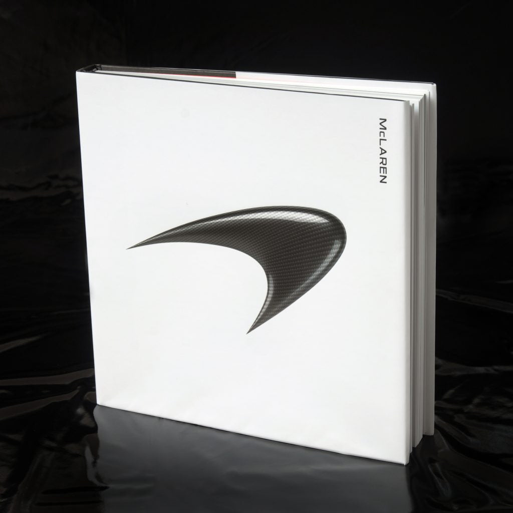 White McLaren slipcase with curved logo on front