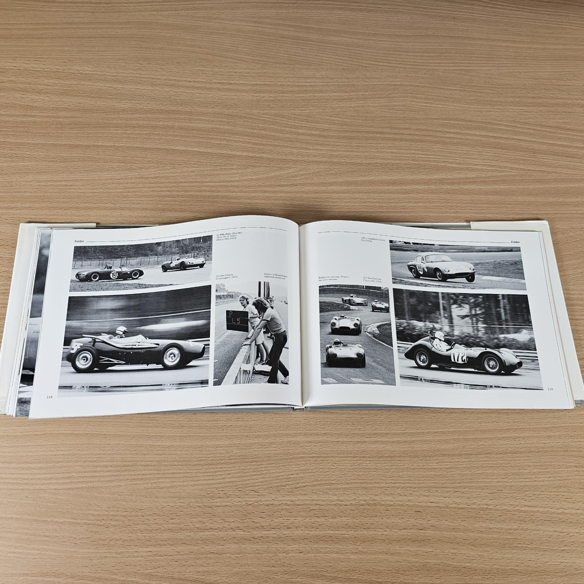 Open book with black-and-white historic racing car photo spreads