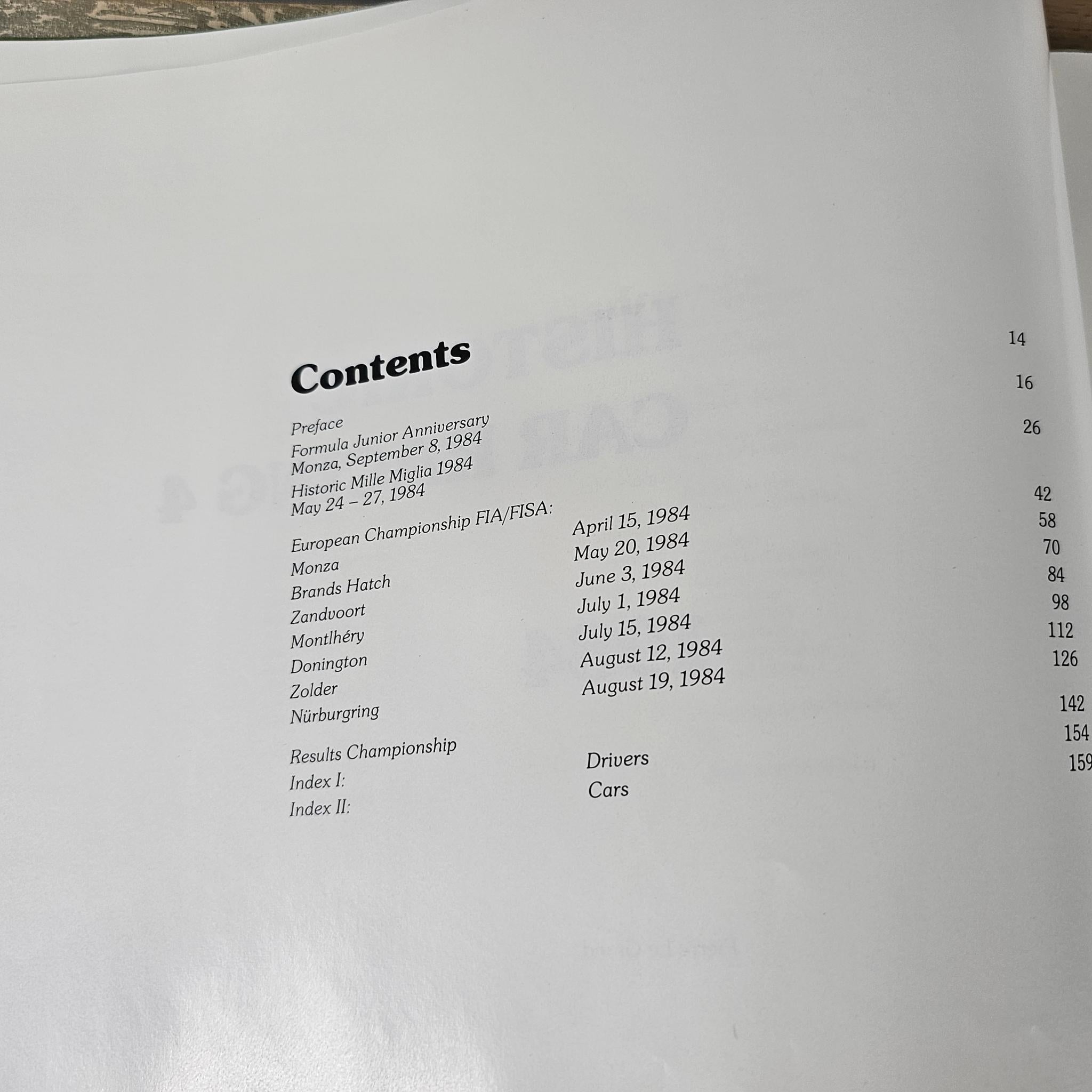 Car racing book contents page listing sections on white paper