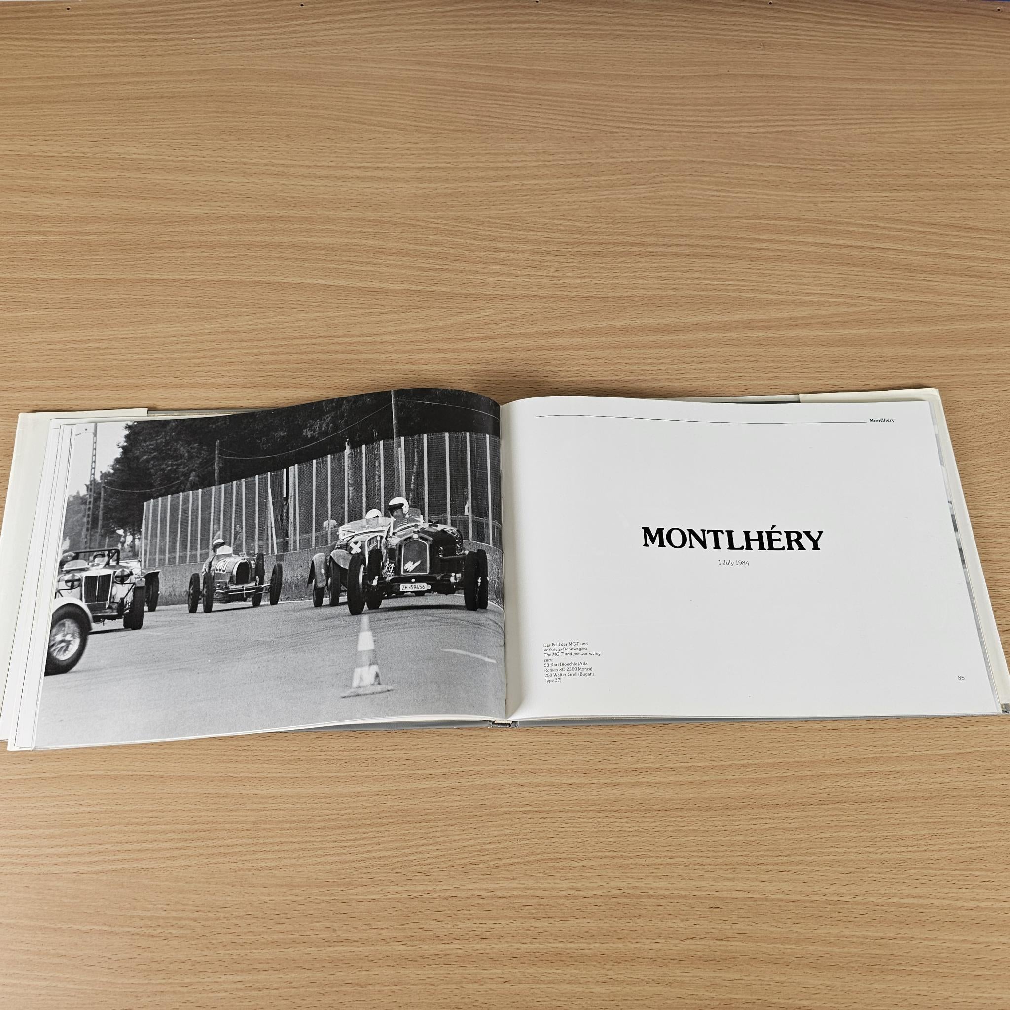Car racing book open spread with black-and-white track scene and heading “MONTLHERY”