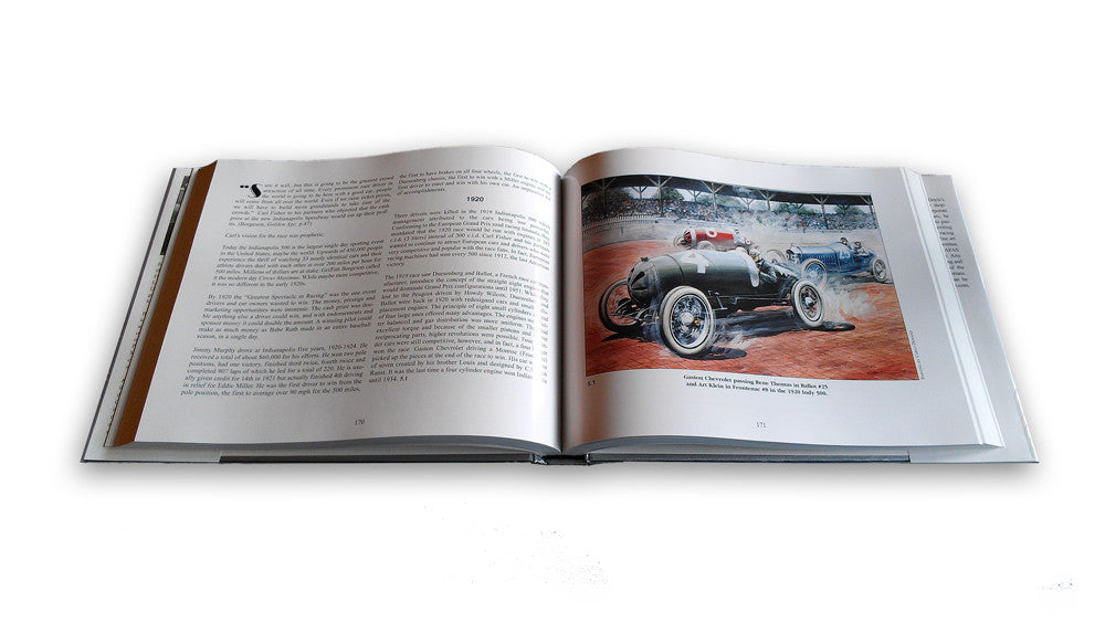 Open racing book showing printed pages and color car photo insert