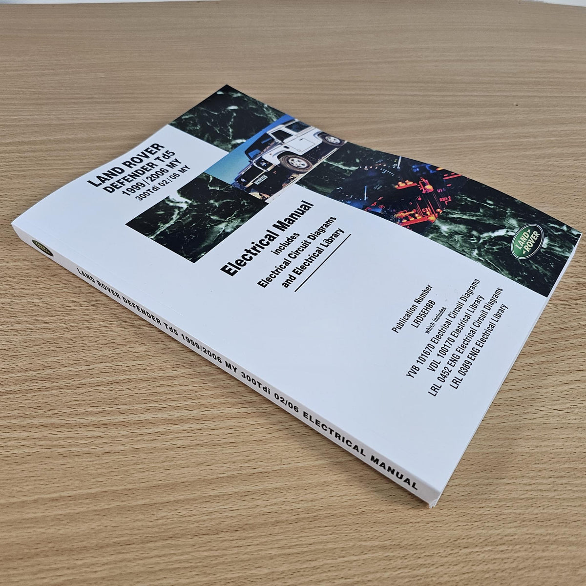 Electrical manual book with Land Rover Defender Td5 cover reading Electrical Manual