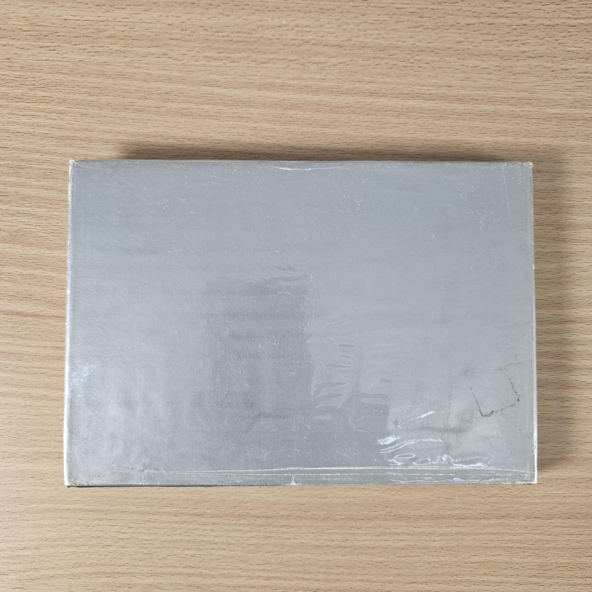 Vintage racing car review book back cover, plain with protective film