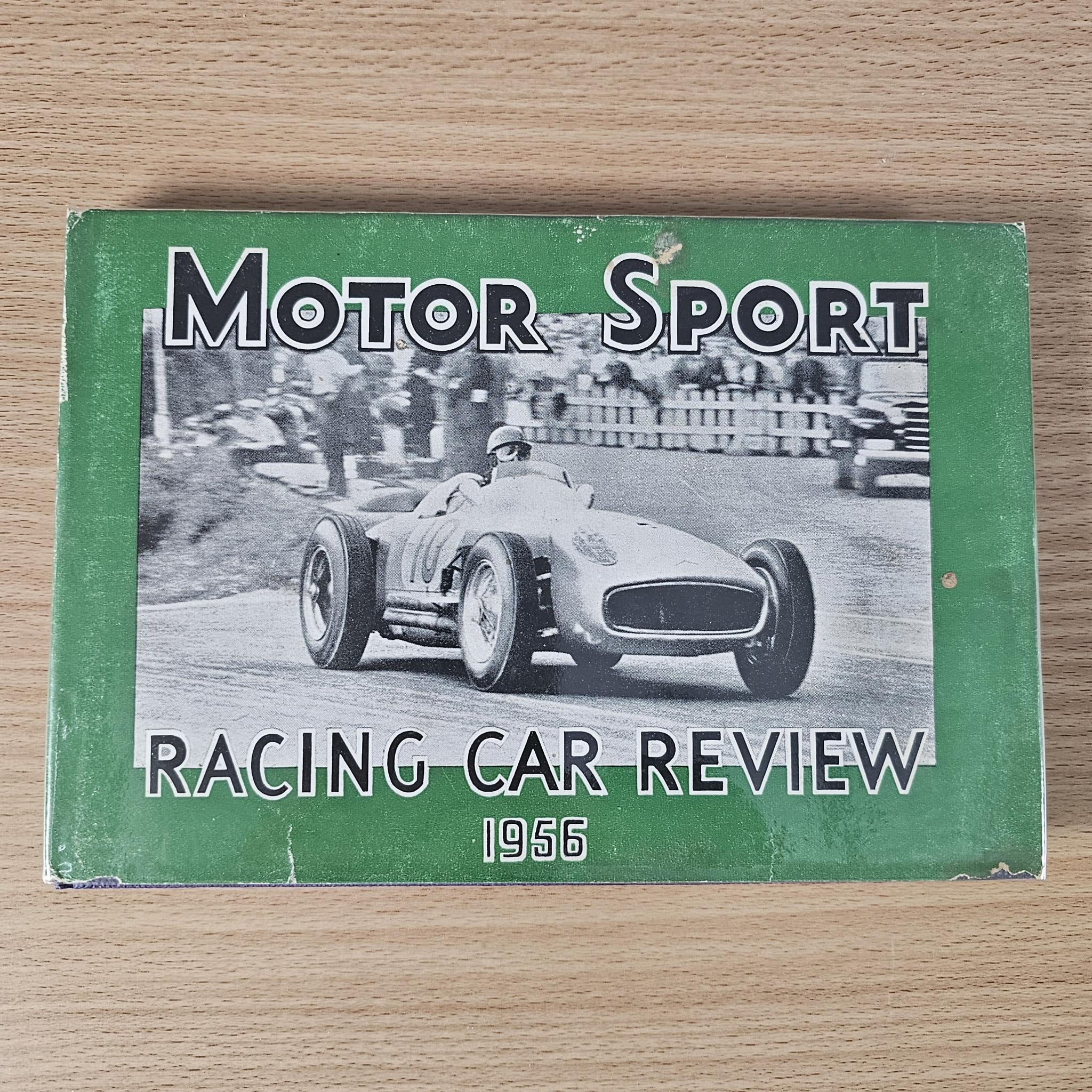Vintage racing car review book cover, green with black-and-white racing car image and 1956