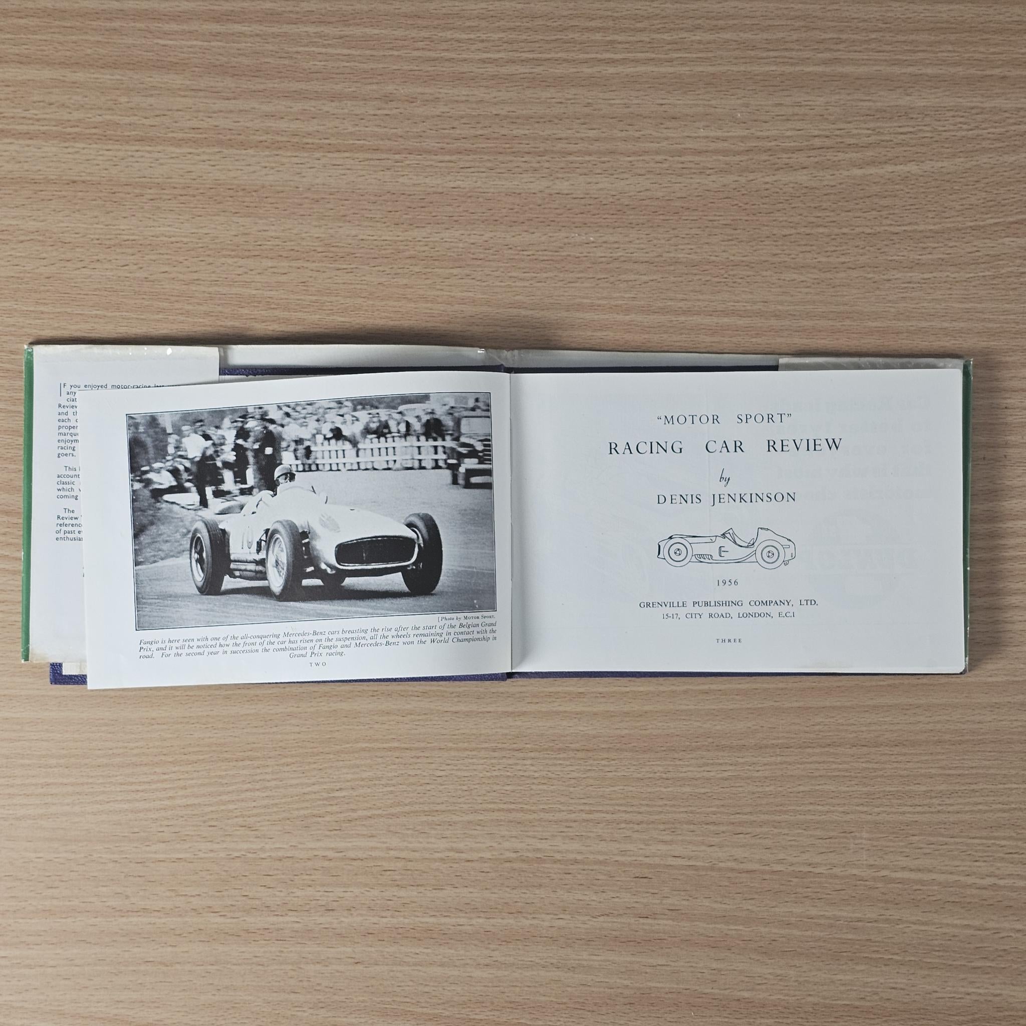 Vintage racing car review book, open spread with car photo and title/author details