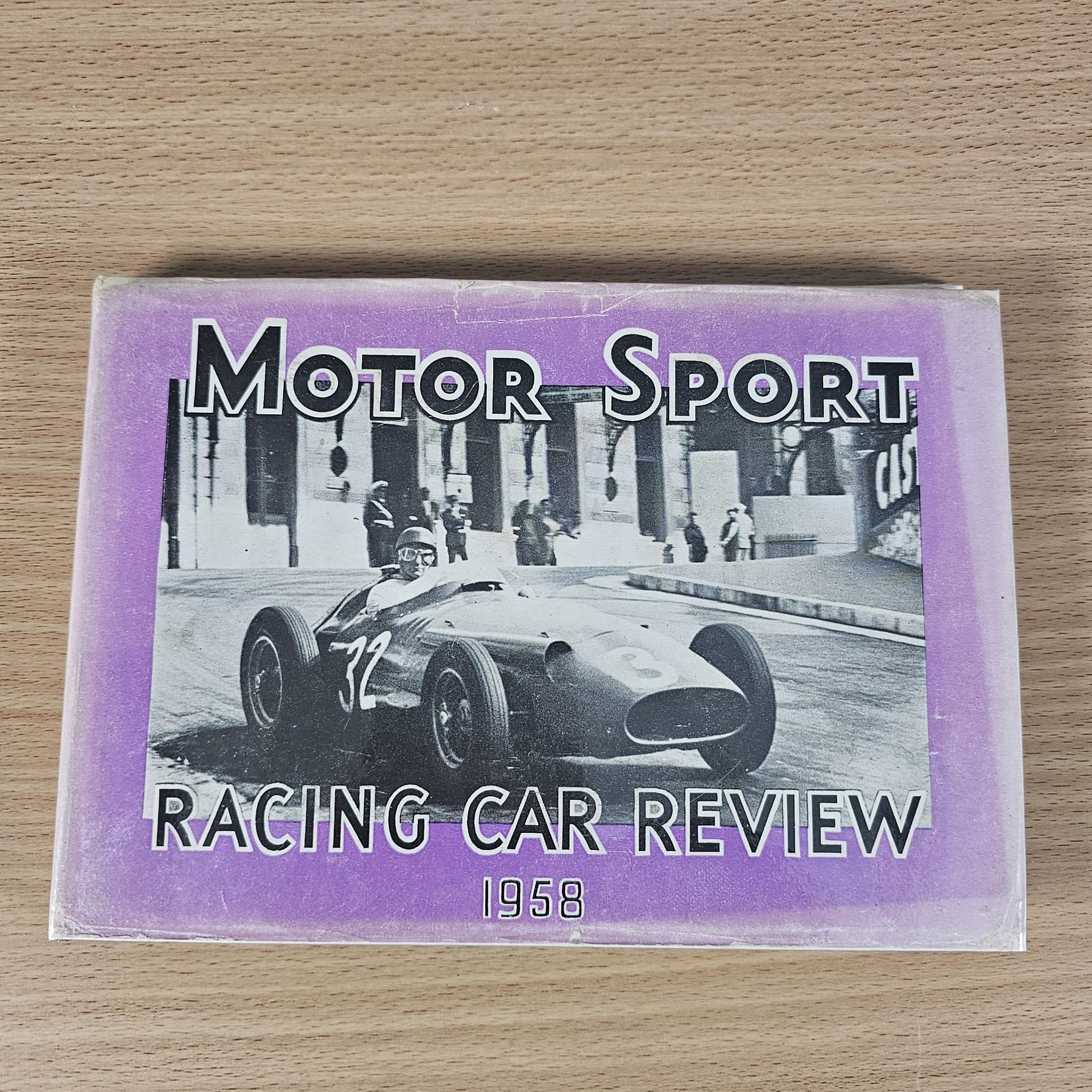 1958 racing car review book cover showing black race car and purple “Racing Car Review” text