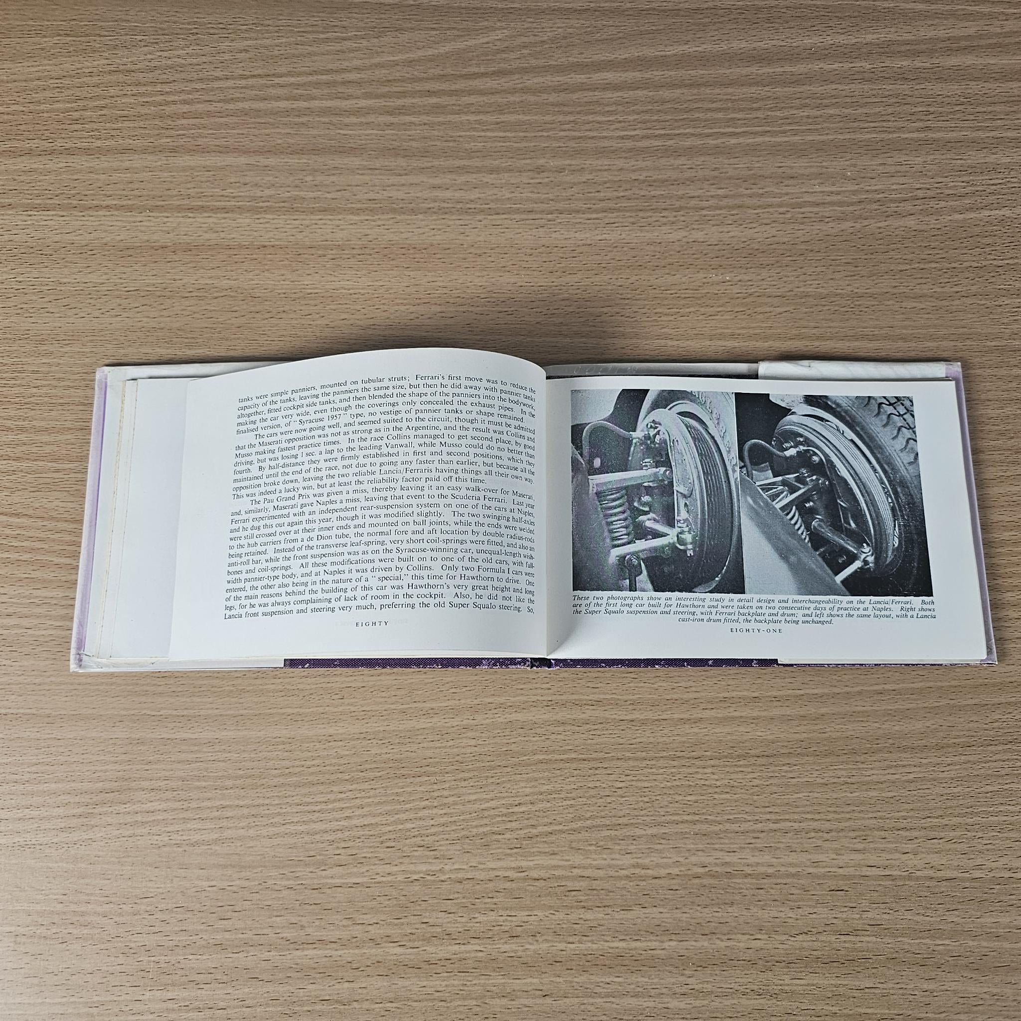 Open 1958 racing car review book with text and black-and-white photo of race car details