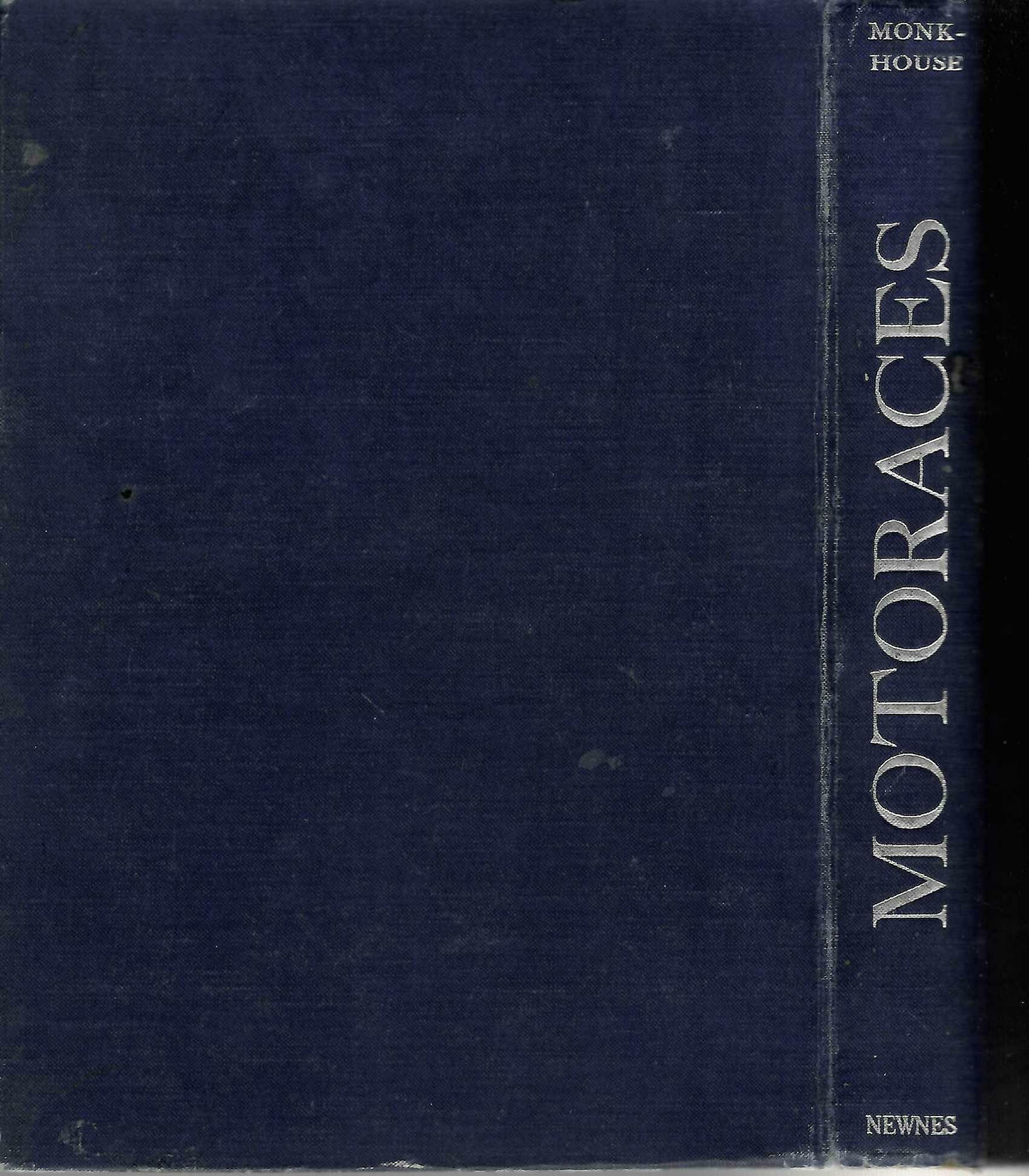 Vintage racing book with navy cloth cover and vertical spine text, hardback