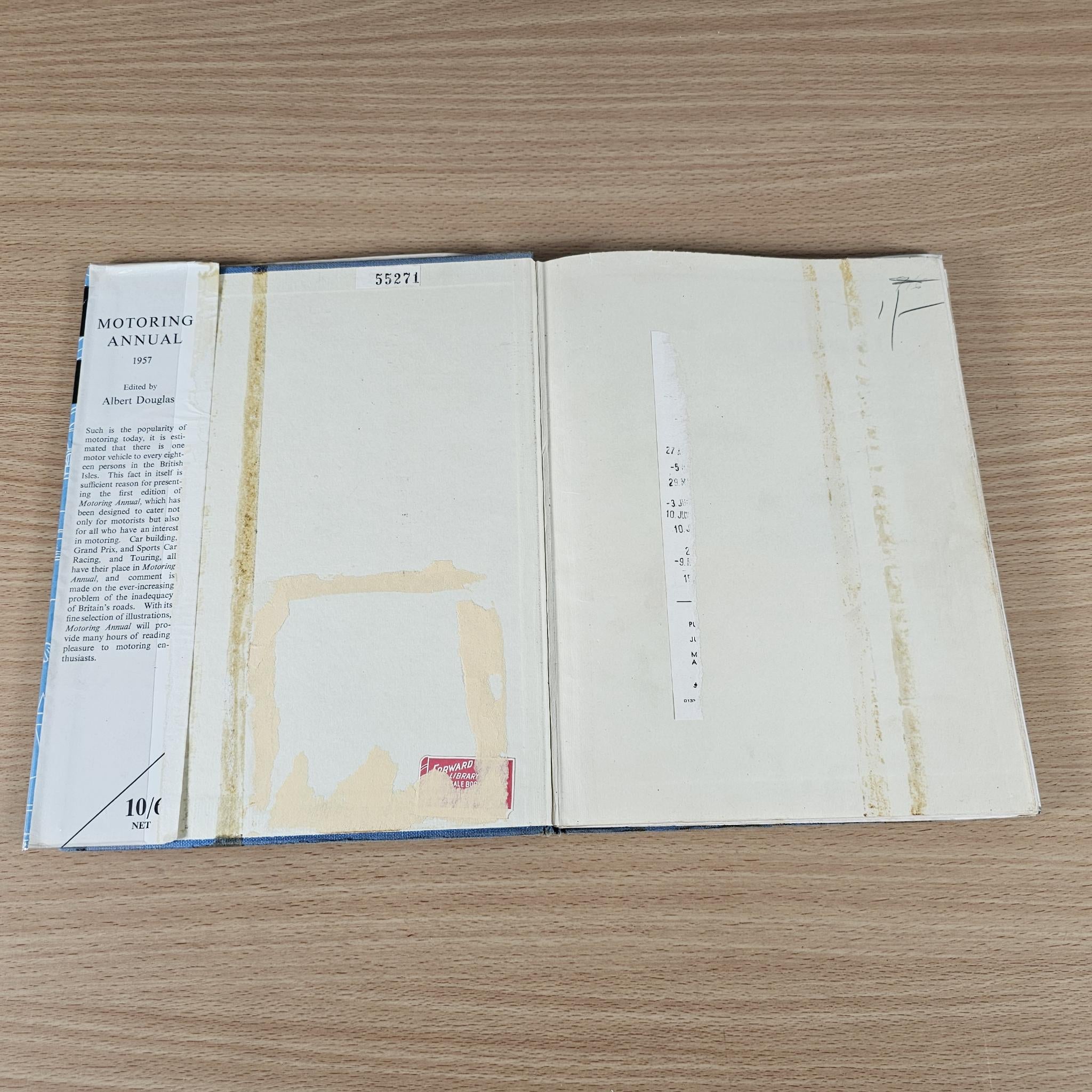 Motoring Annual open book pages with front matter and printed markings