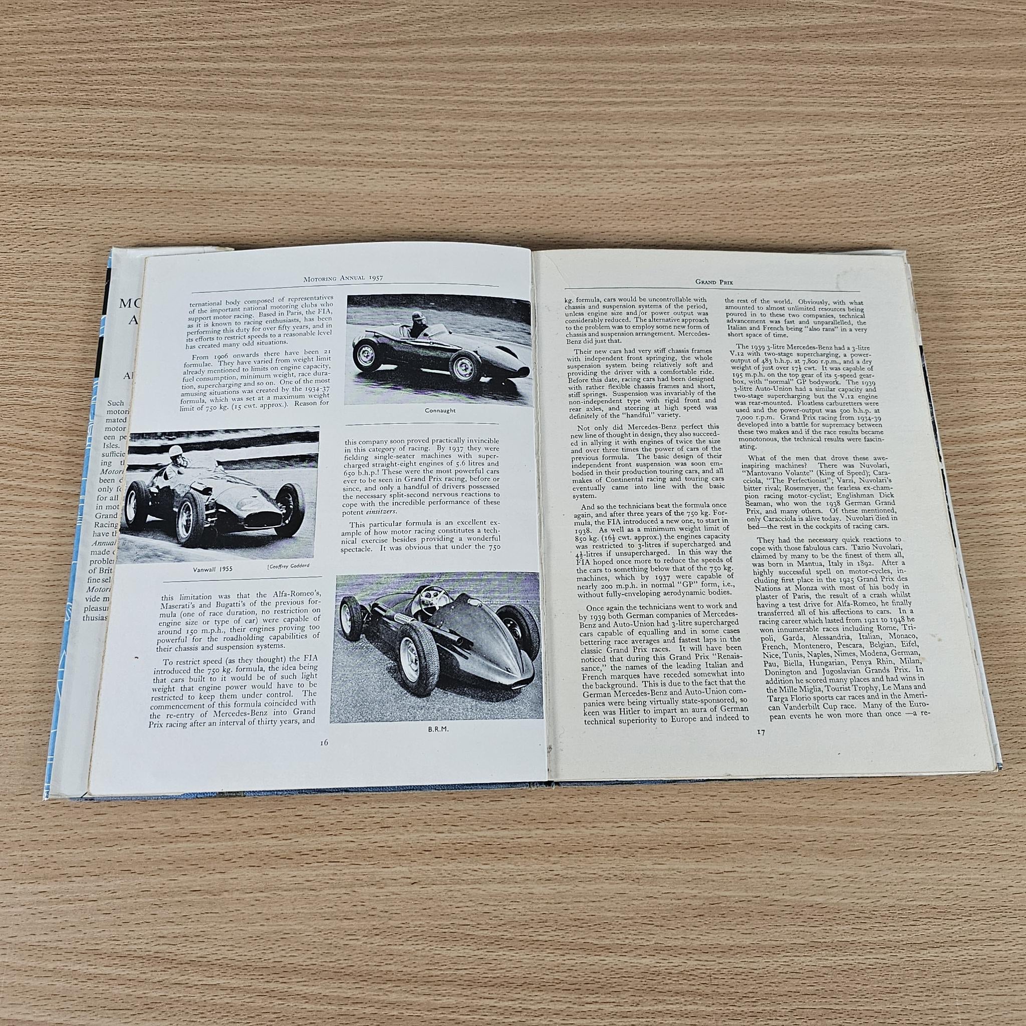 Motoring Annual open book with black-and-white car photos and article text