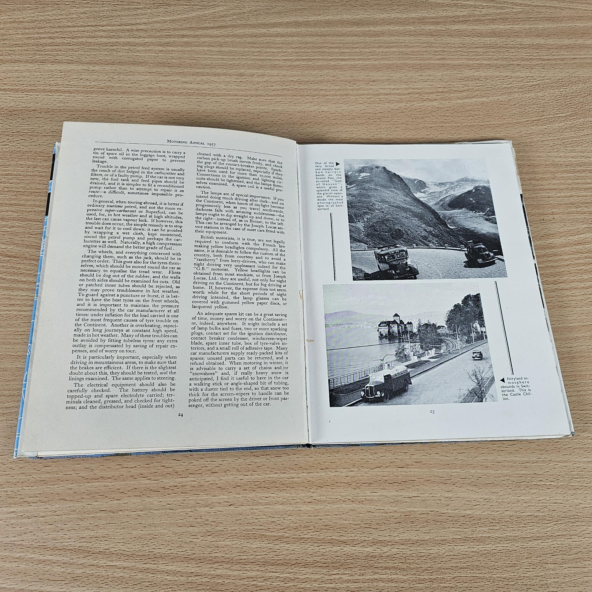 Motoring Annual open book with car articles and black-and-white event photos