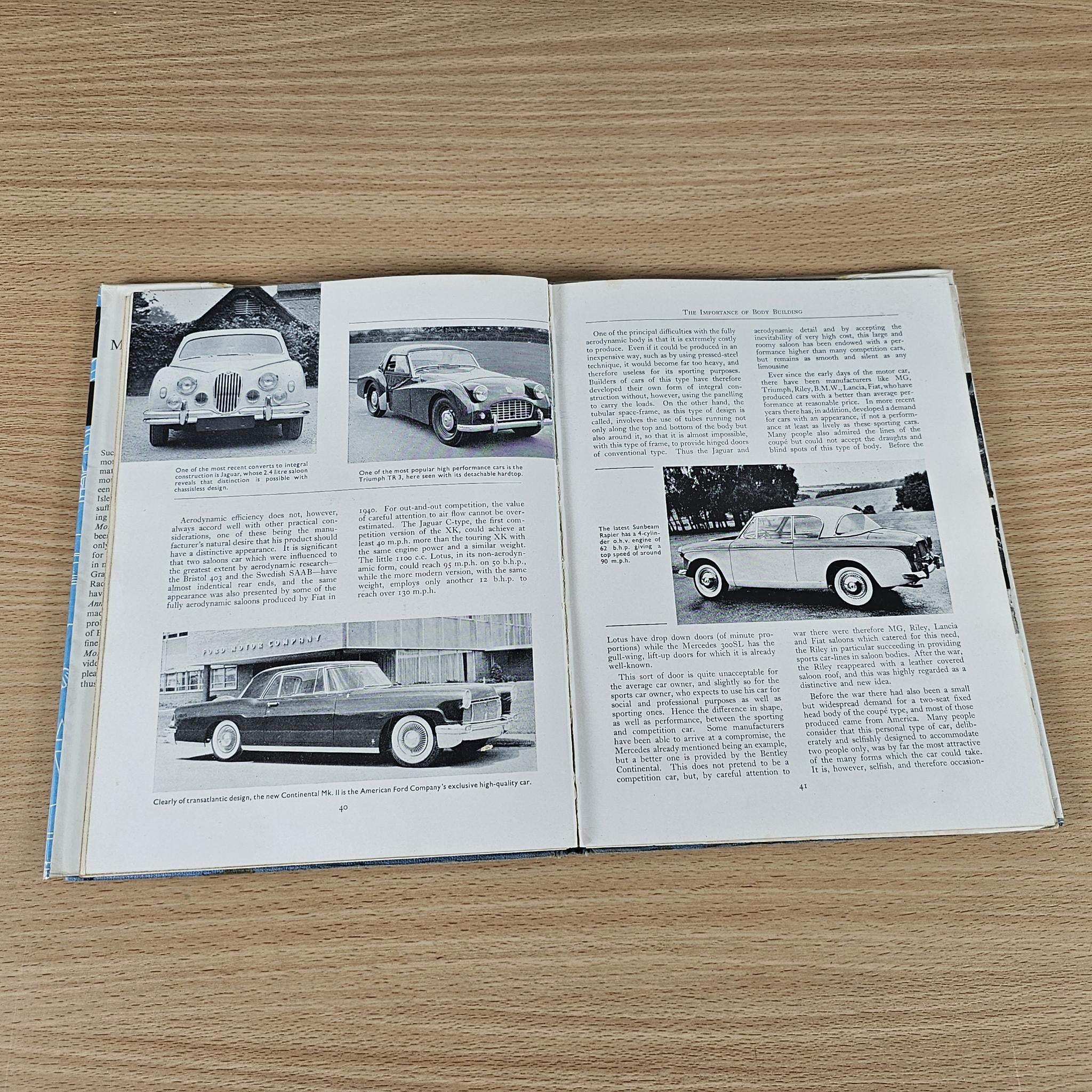 Motoring Annual open book with classic car photos and detailed article text