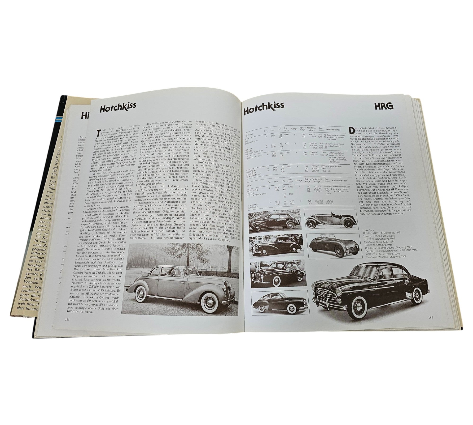 Postwar passenger car book open featuring Hotchkiss pages with car photos