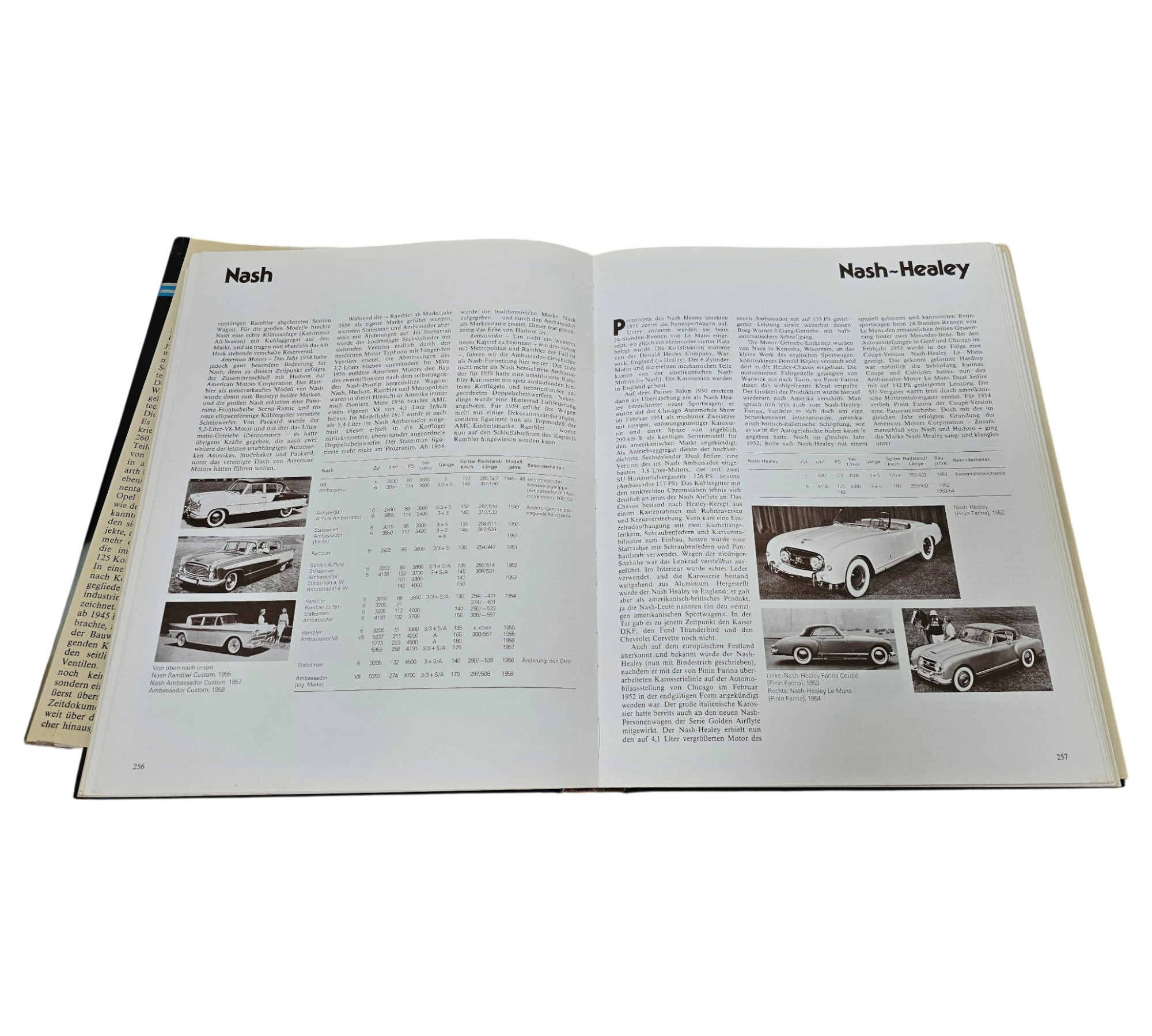 Vintage automotive reference book, open spread with model tables and car photos