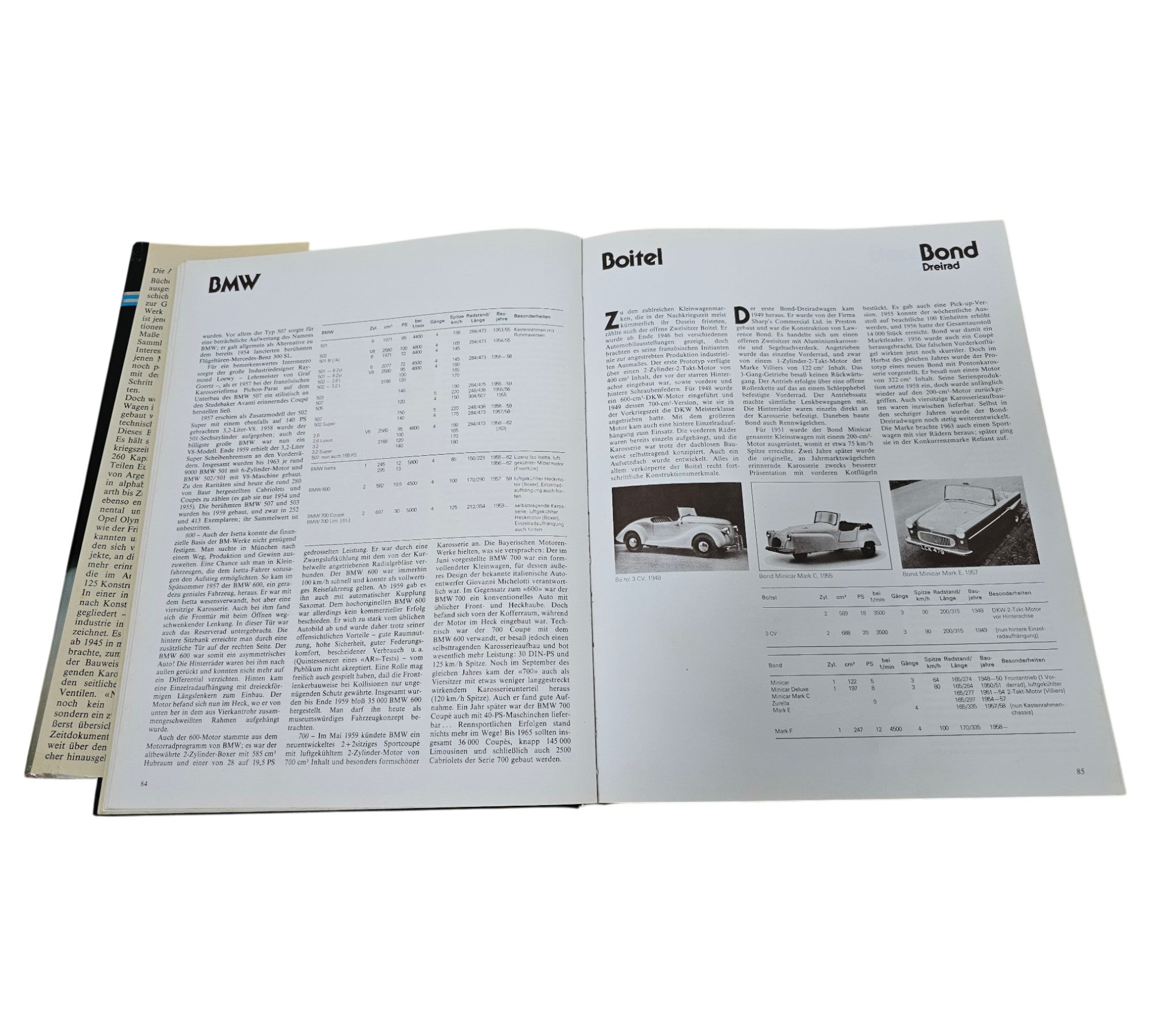 Postwar passenger car book open with BMW and other marque text columns