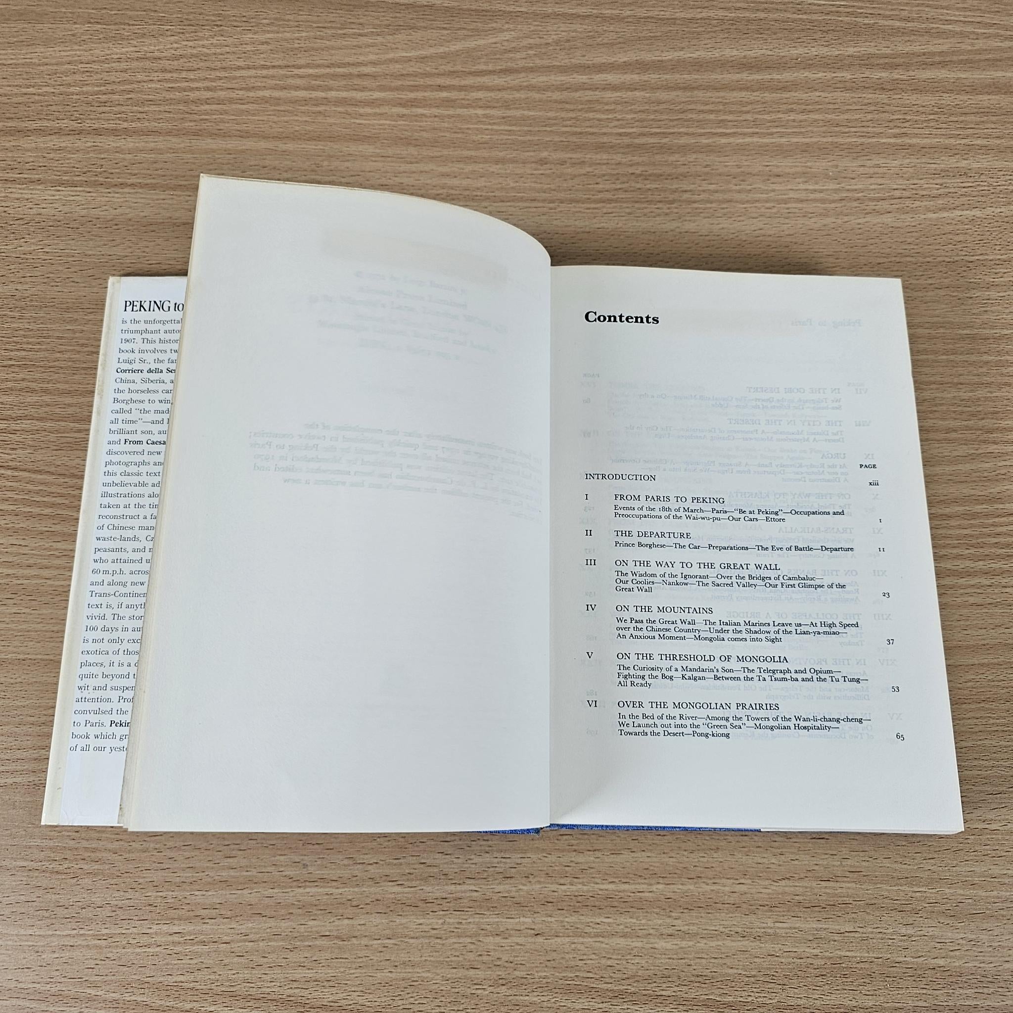Hardcover book open to Contents page listing chapters and page numbers