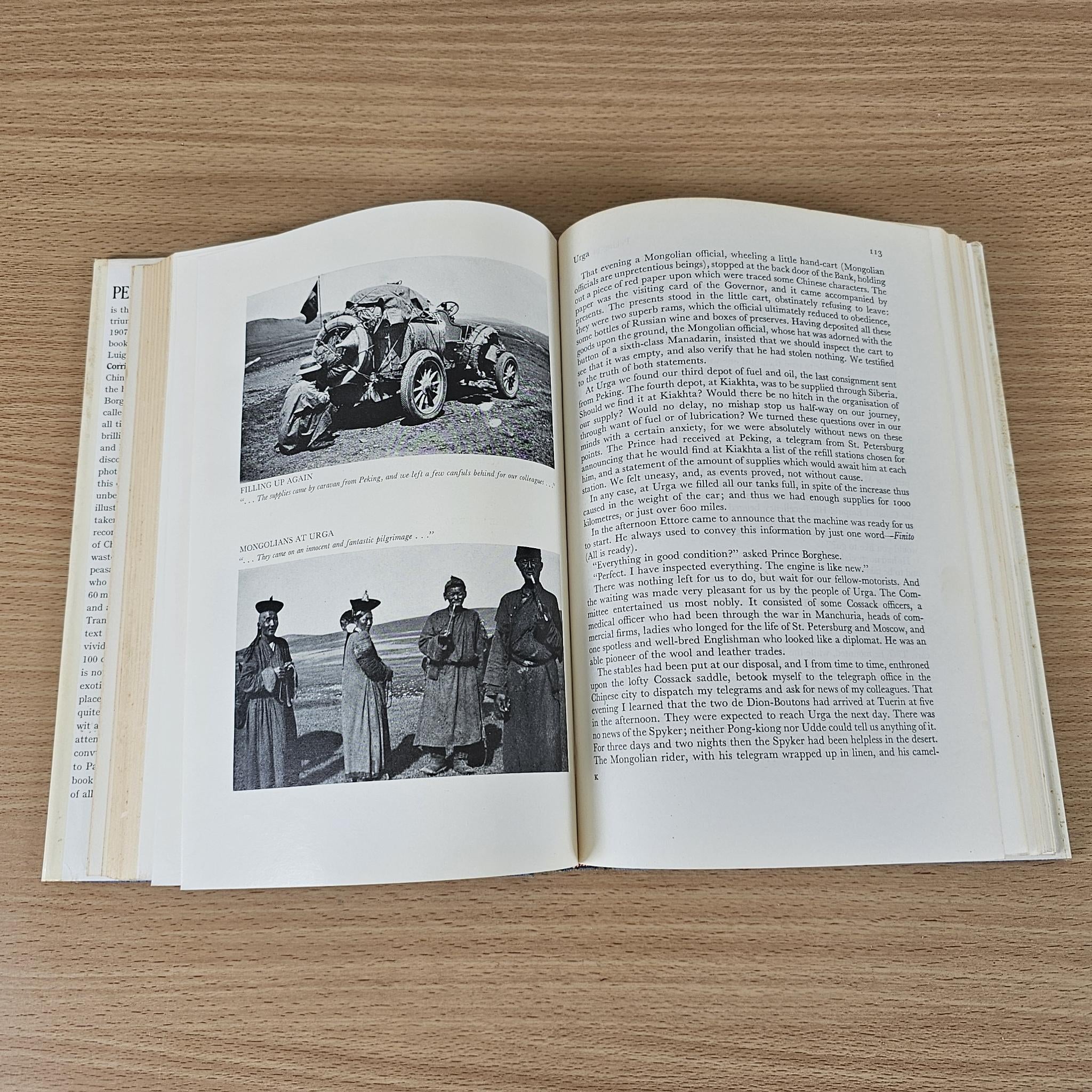 Hardcover book open to pages with black-and-white photos, captions, and paragraphs