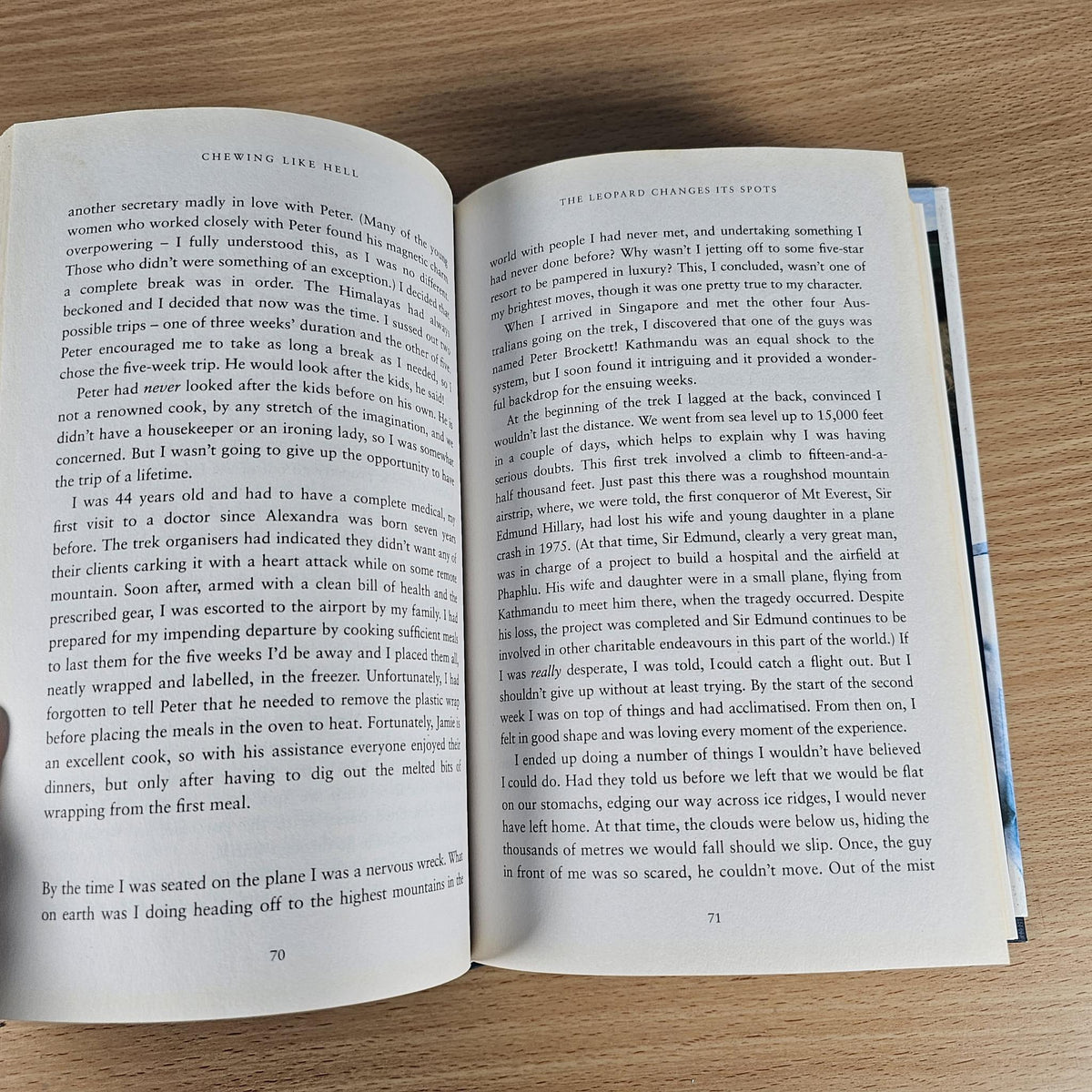 Open book with dense printed text on two pages, page numbers 70–71 visible