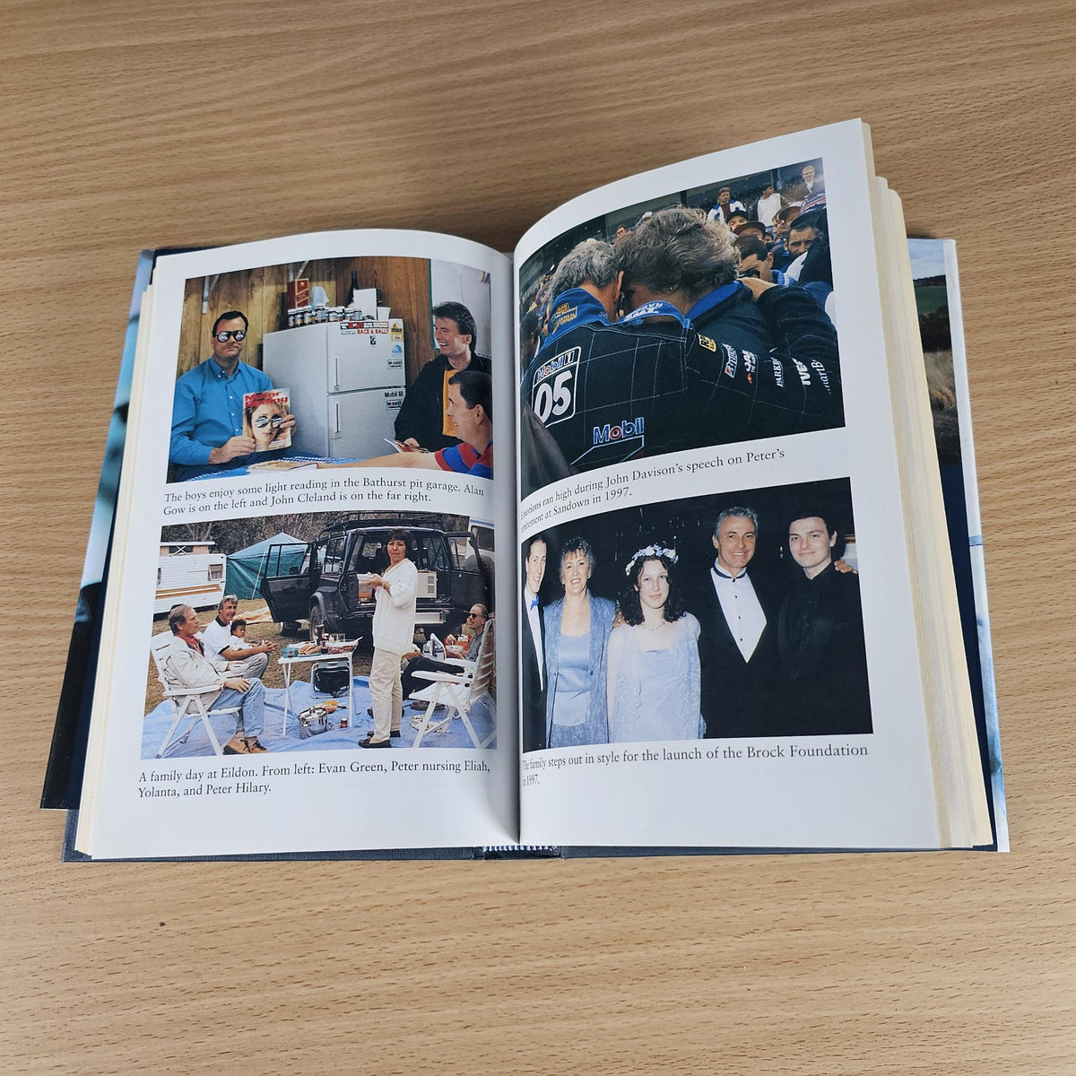 Open book spread with color photos and small captions