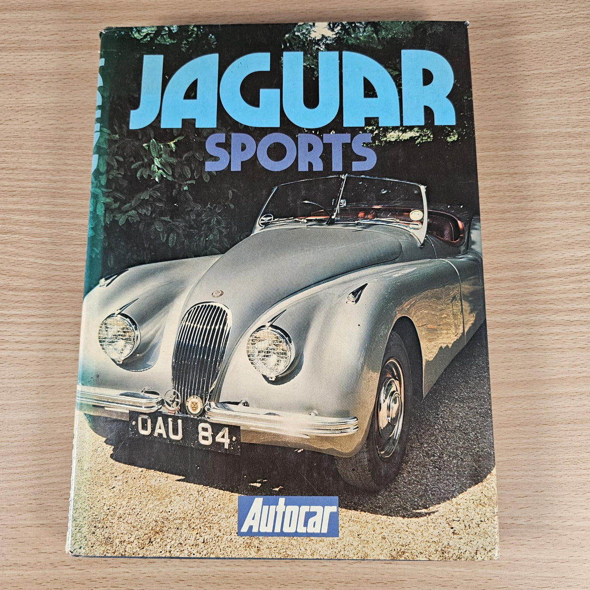 Jaguar Sports Autocar book cover with classic Jaguar car photo and teal title text