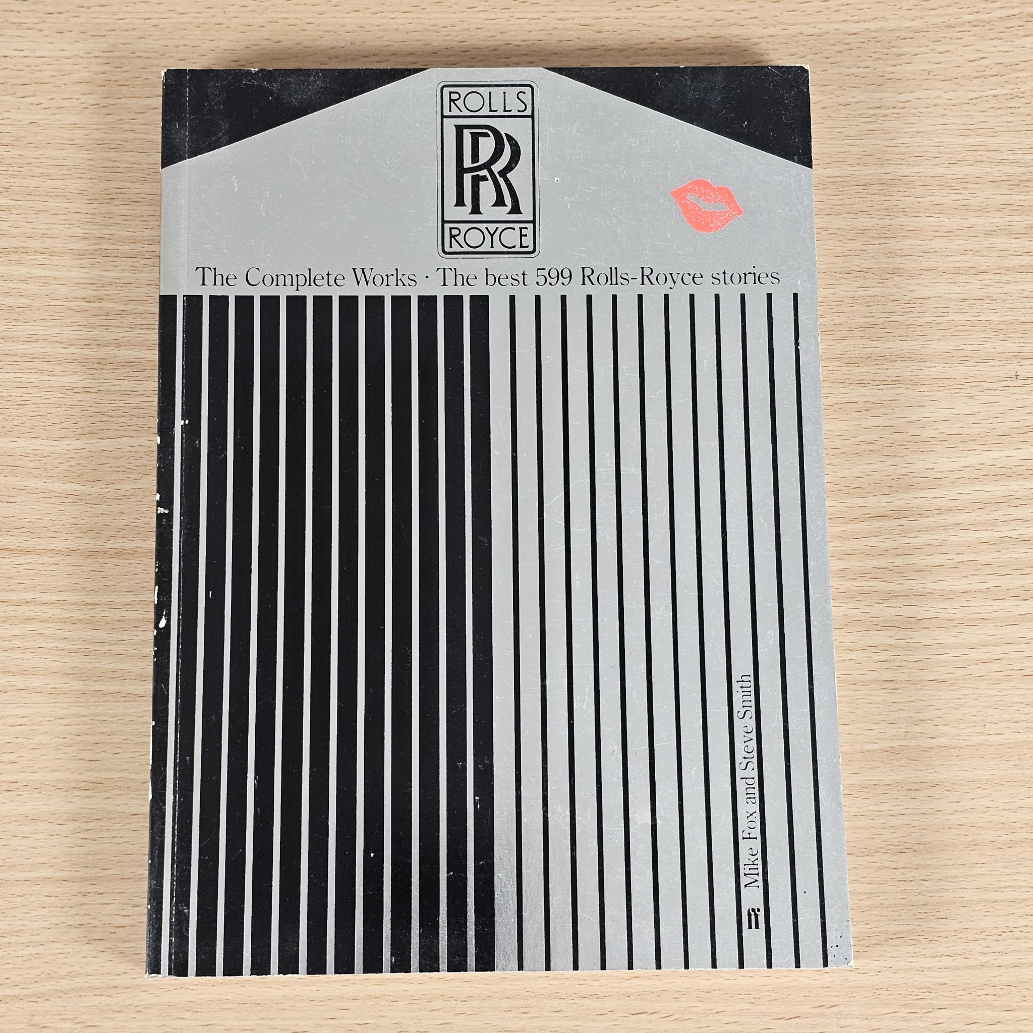 Hardcover book cover with logo badge, title text, and black vertical stripe panel