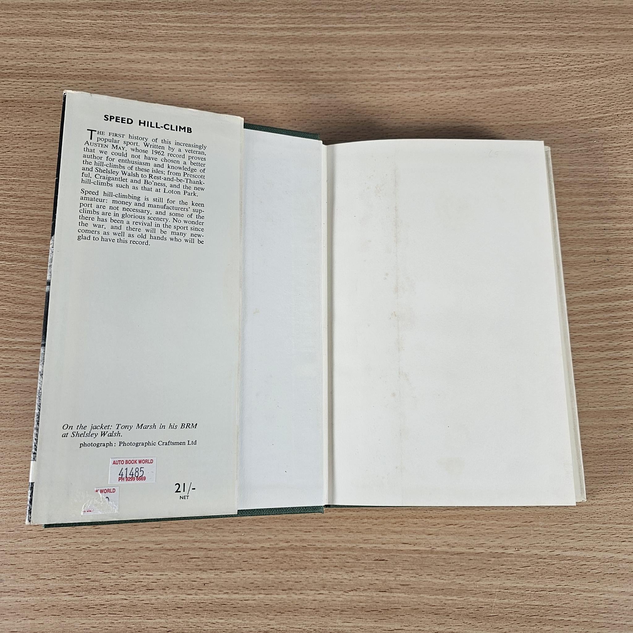 Vintage book open flat with printed text on both pages