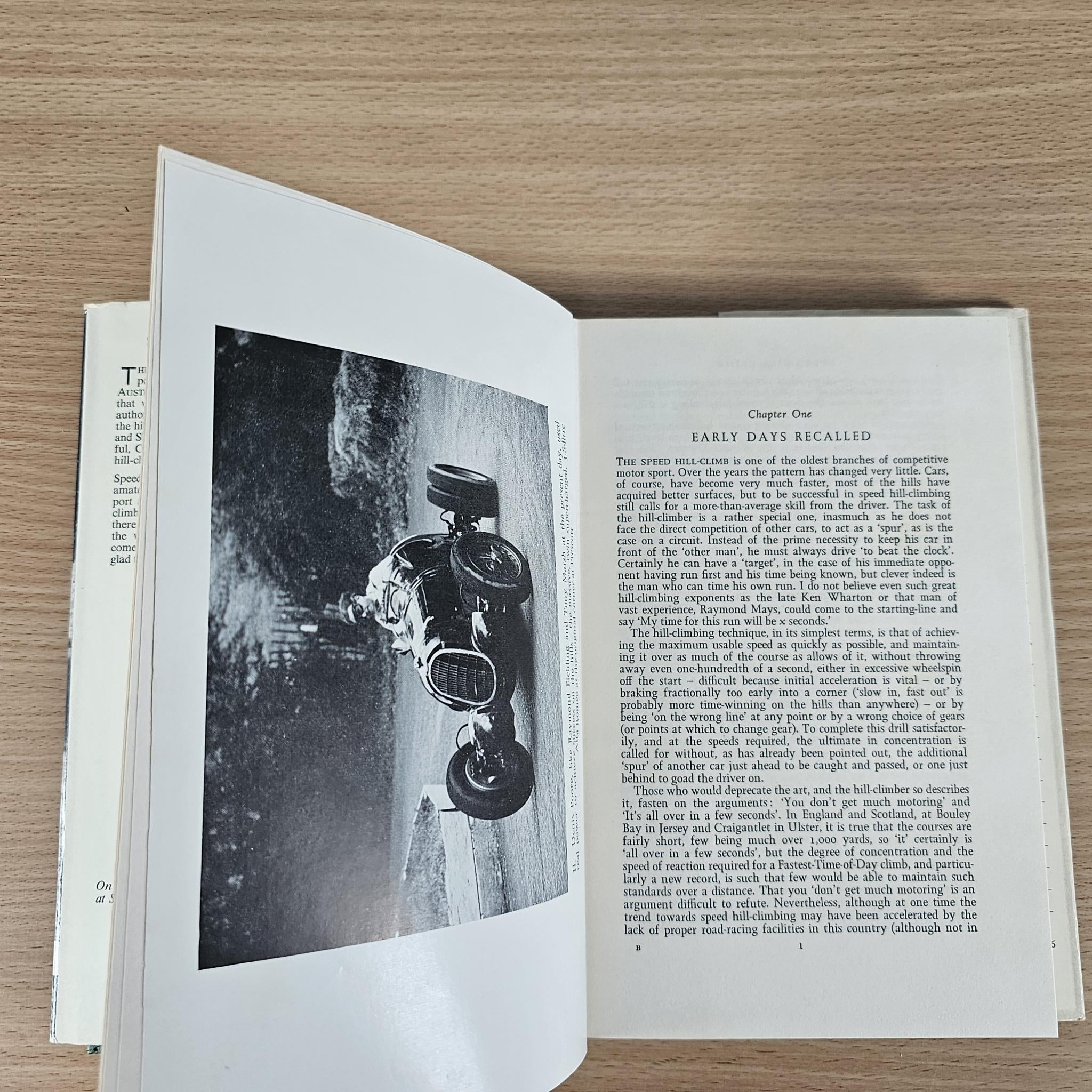 Open vintage book page with black-and-white photo and article text