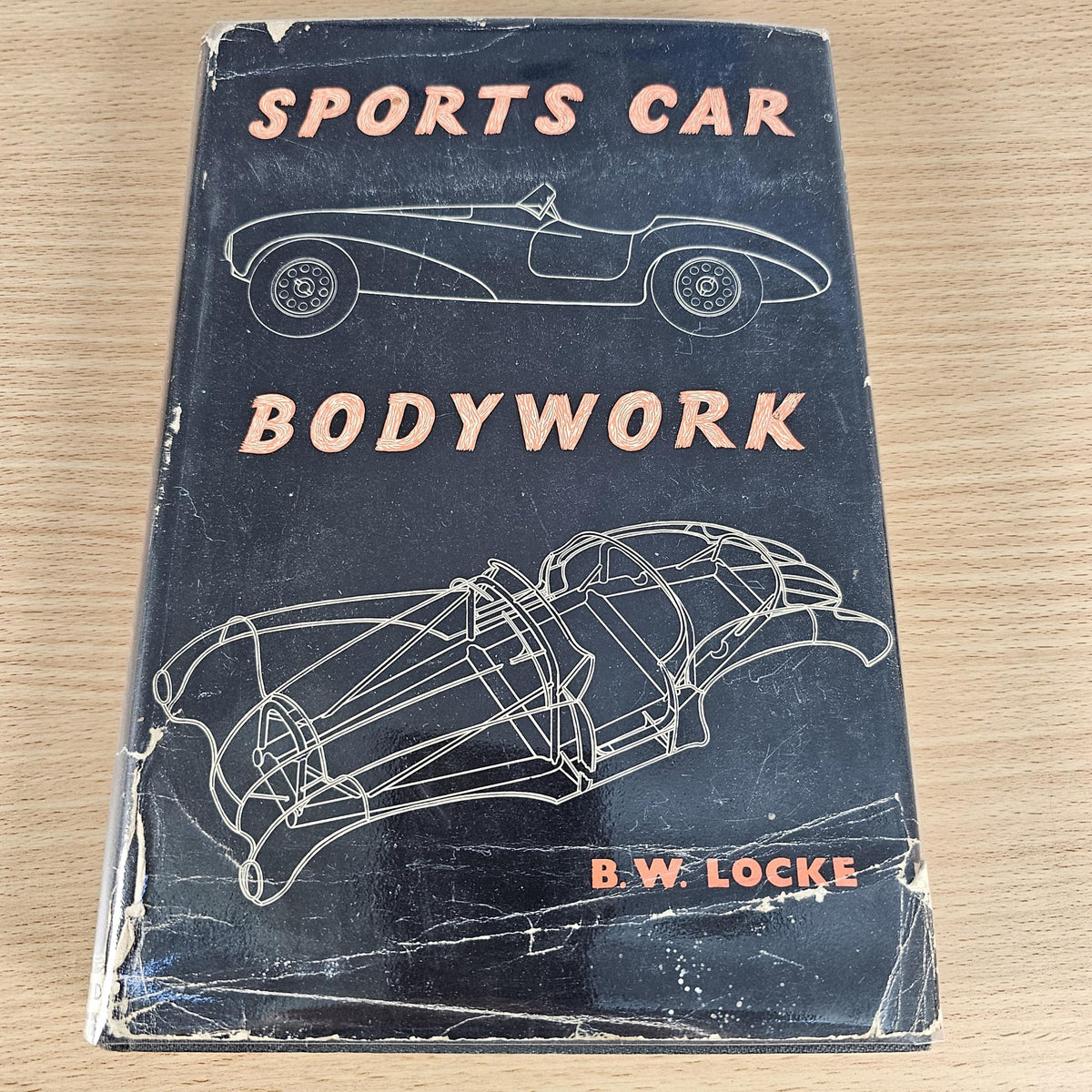 Sports Car Bodywork hardback book cover, blue-gray with car body line art and B. W. Locke label.