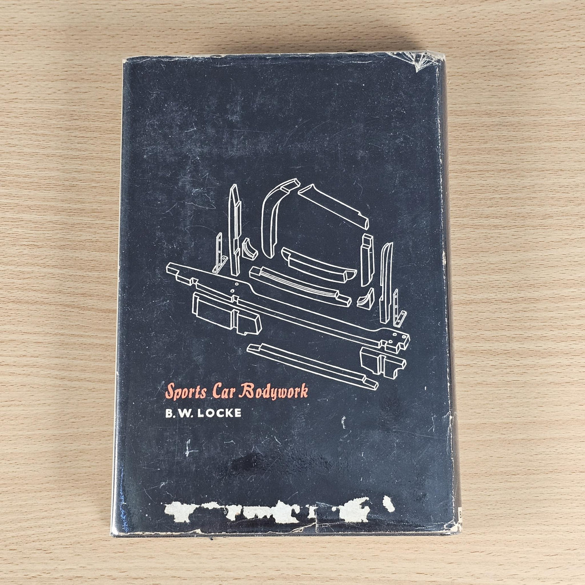 Sports Car Bodywork book back cover with technical line diagrams and “Sports Car Bodywork” text.
