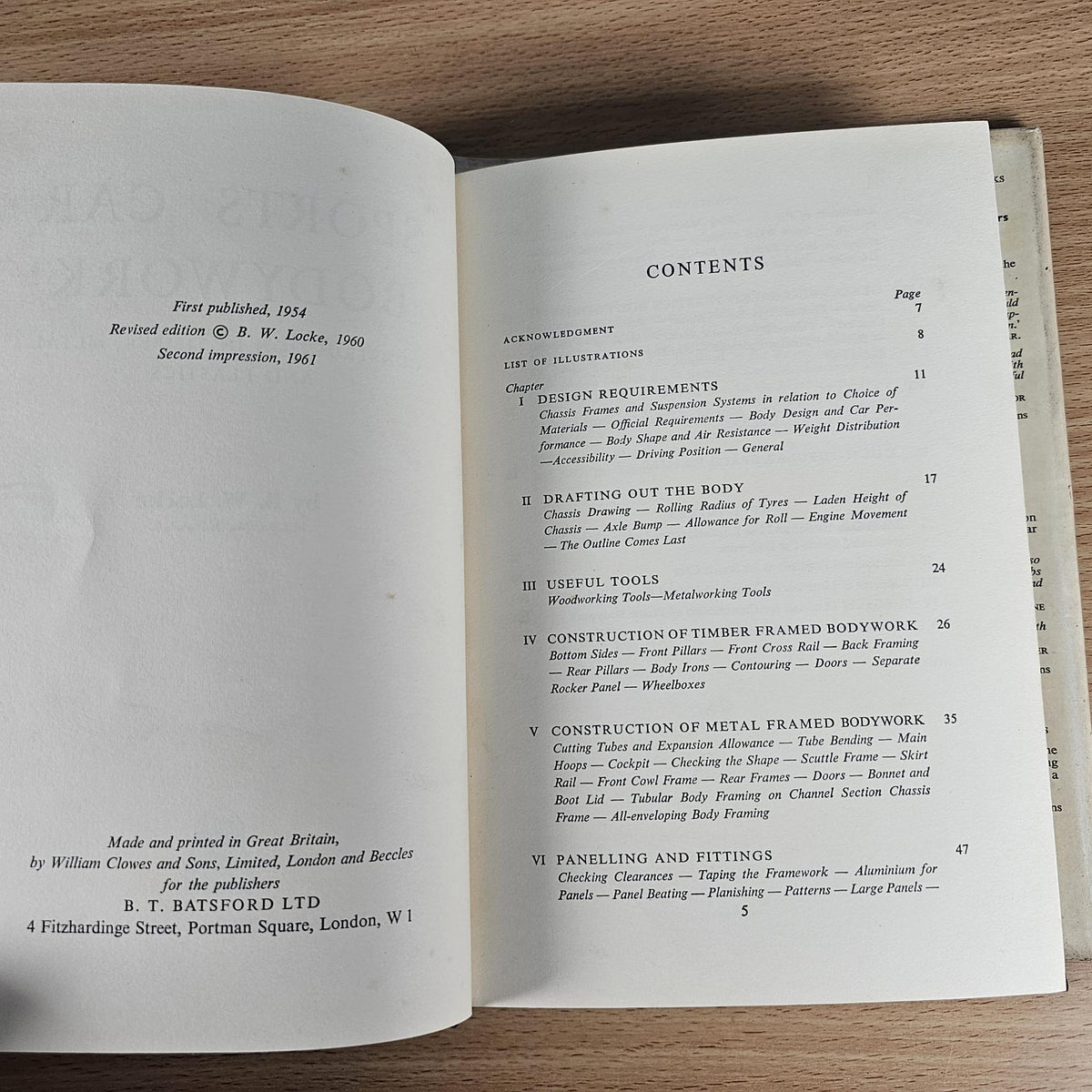 Sports Car Bodywork book open to contents pages with section listings and page numbers.