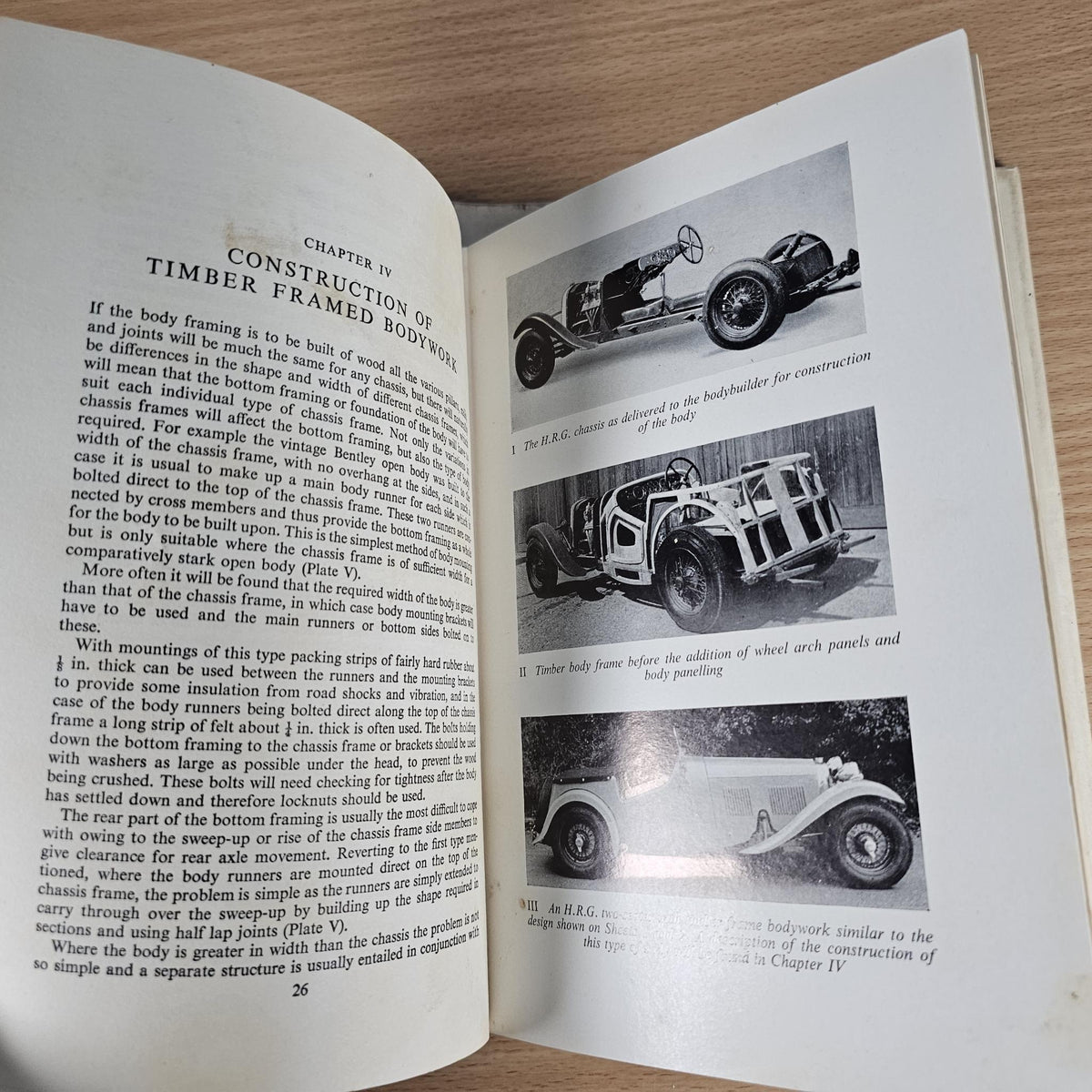 Sports Car Bodywork book open to chapter text with black-and-white car construction photos.