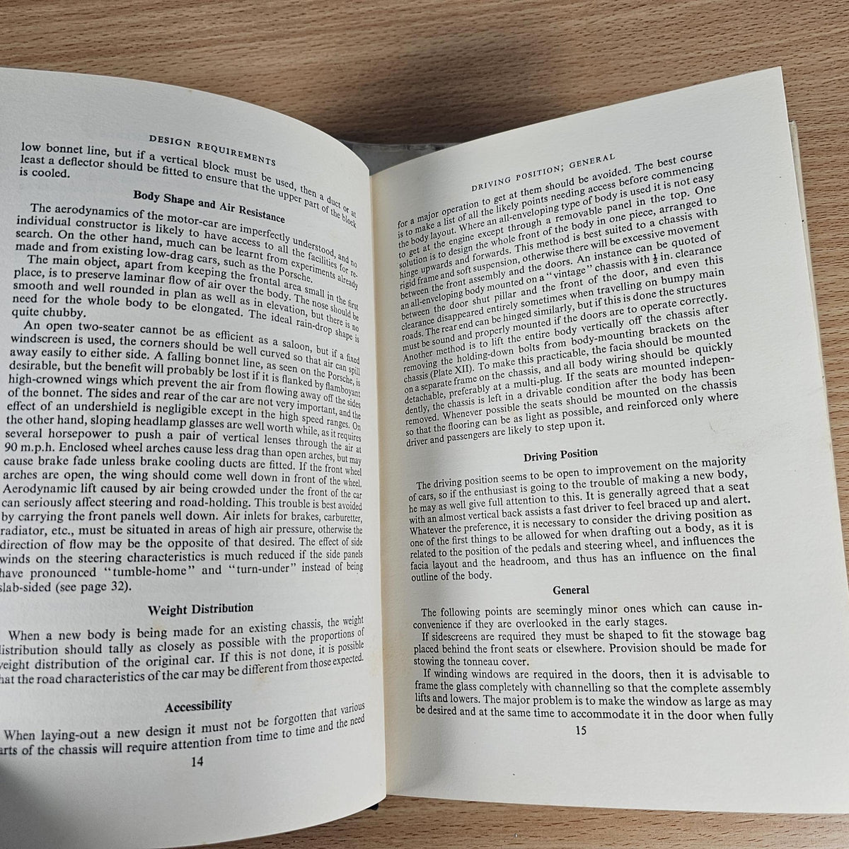 Sports Car Bodywork book open to “Design Requirements” and “Weight Distribution” pages.