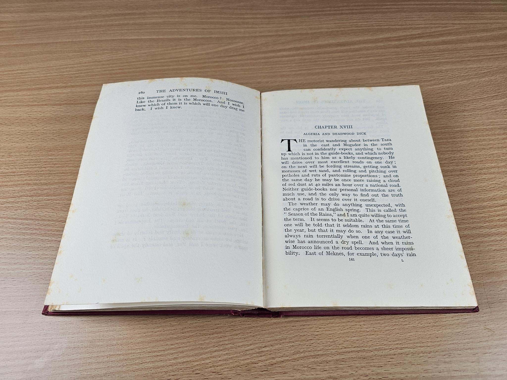 Open book spread with printed paragraphs, no visible illustration