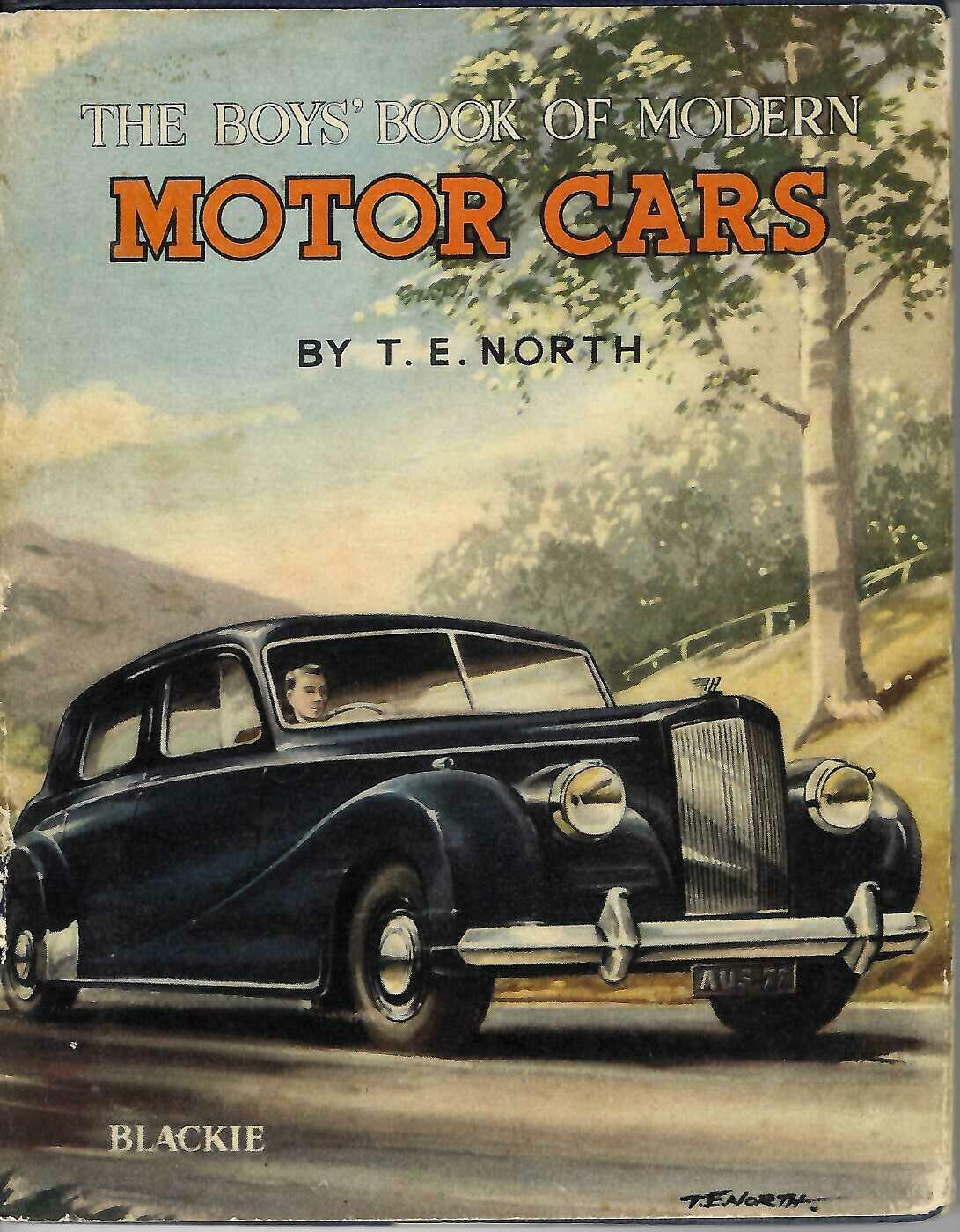 Hardcover book with illustrated cover featuring a black classic motor car and title text