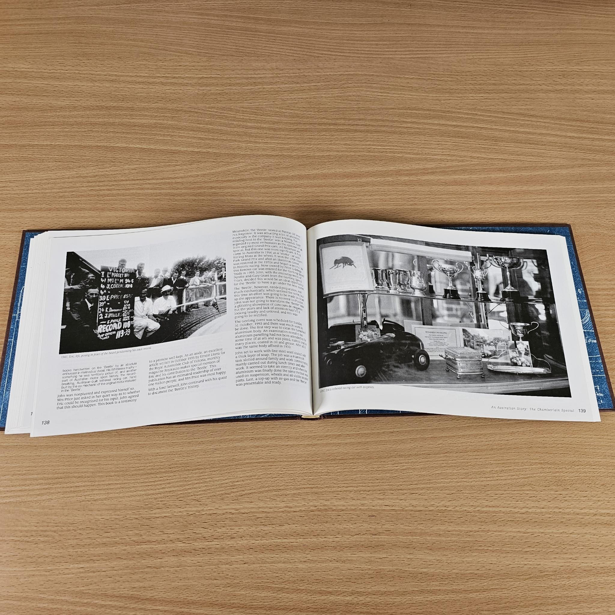 Open book with black-and-white diagrams on left and large photo panel on right