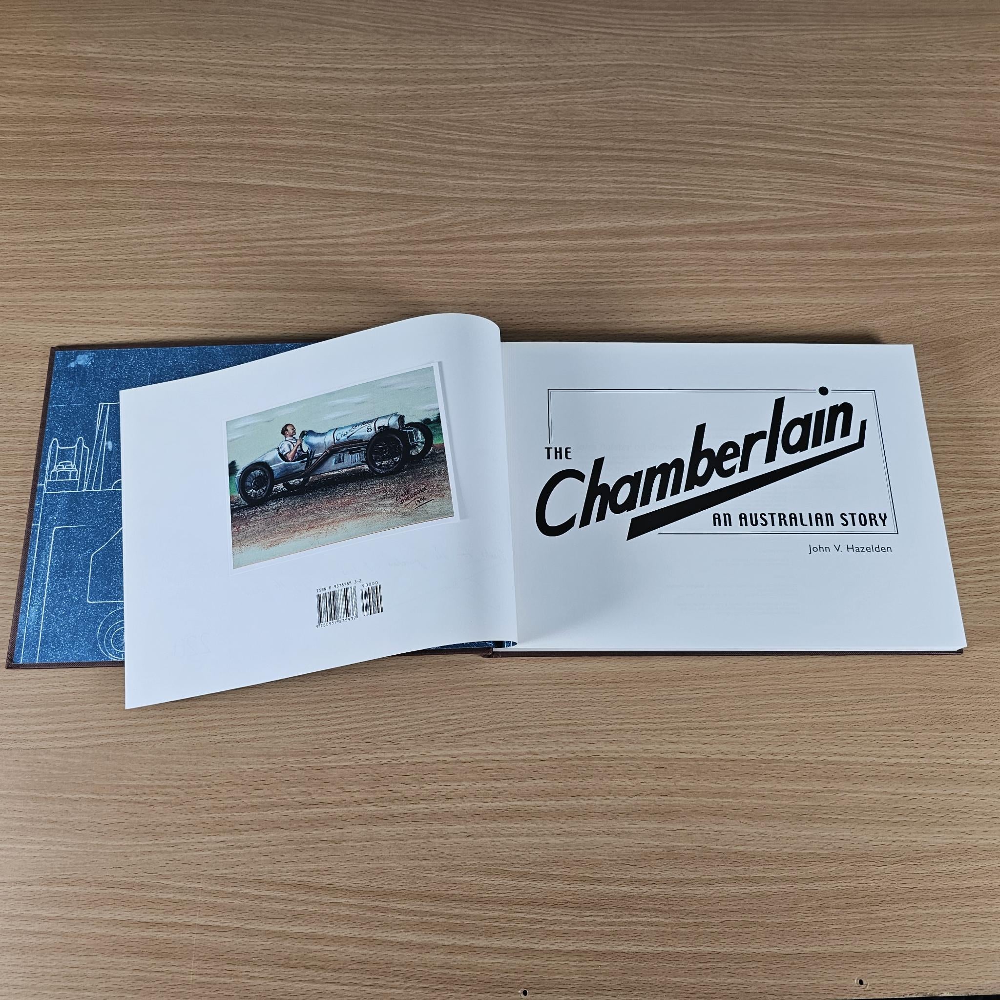 Open book showing car photo on a page and bold title header