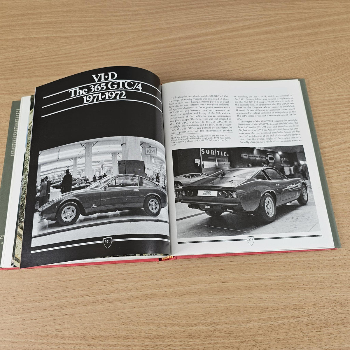Ferrari road car book, open spread with dark chapter heading and vintage car photos.