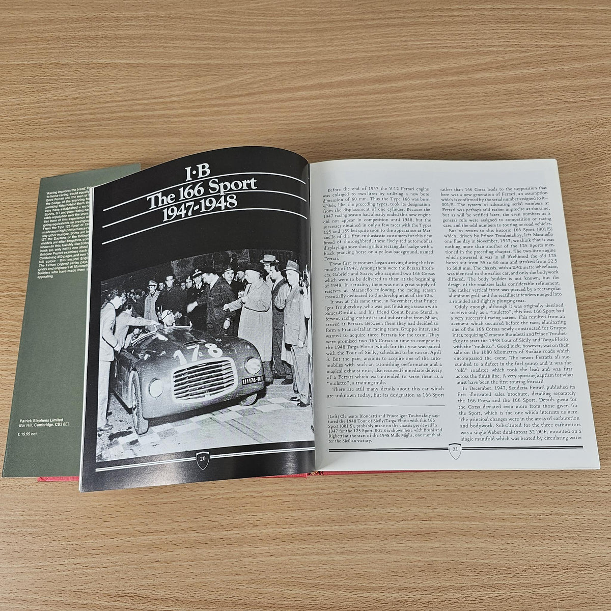 Ferrari book open to “1B The 166 Sport 1947–1948” page with black-and-white photo