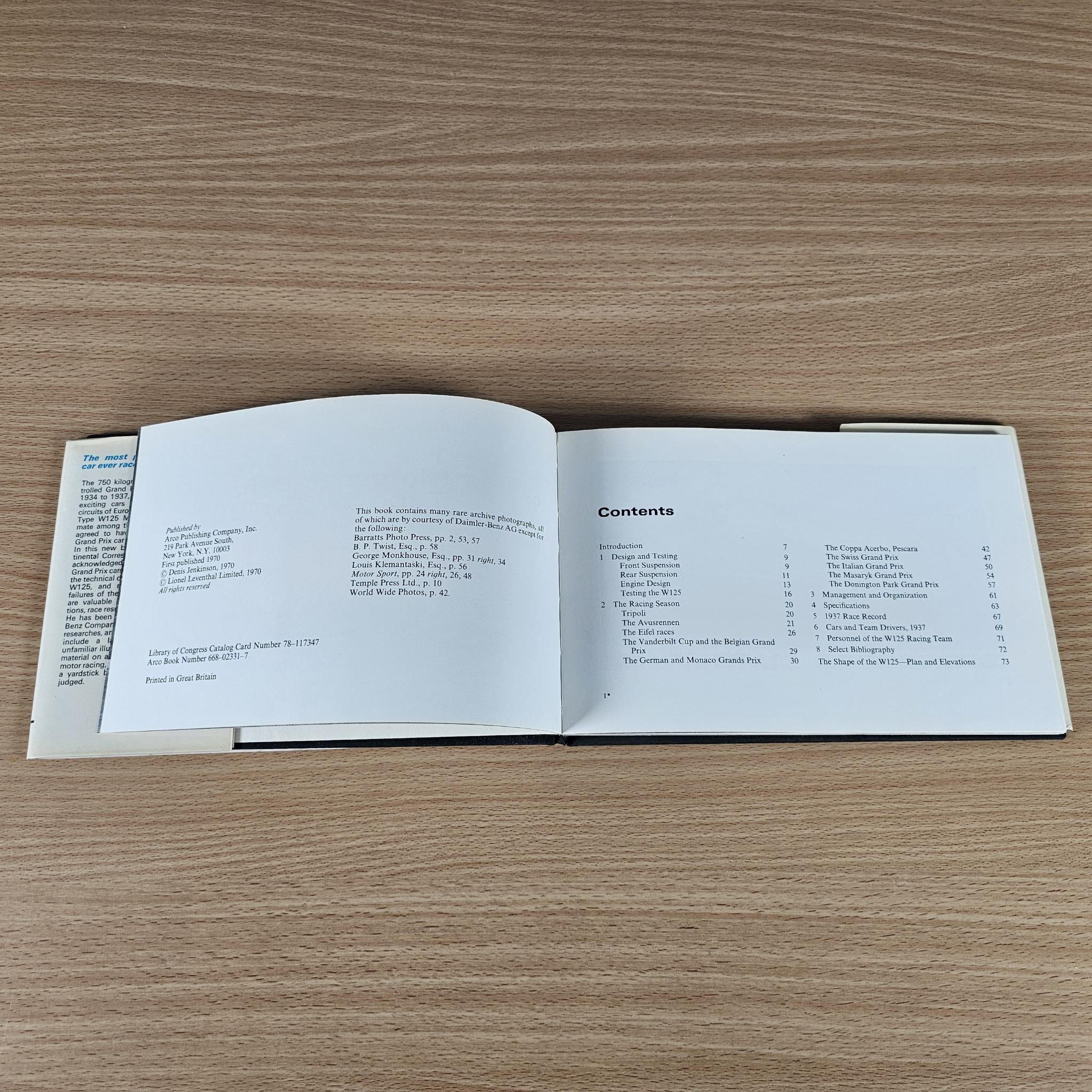 Open race car book showing the Contents page with a list and sections