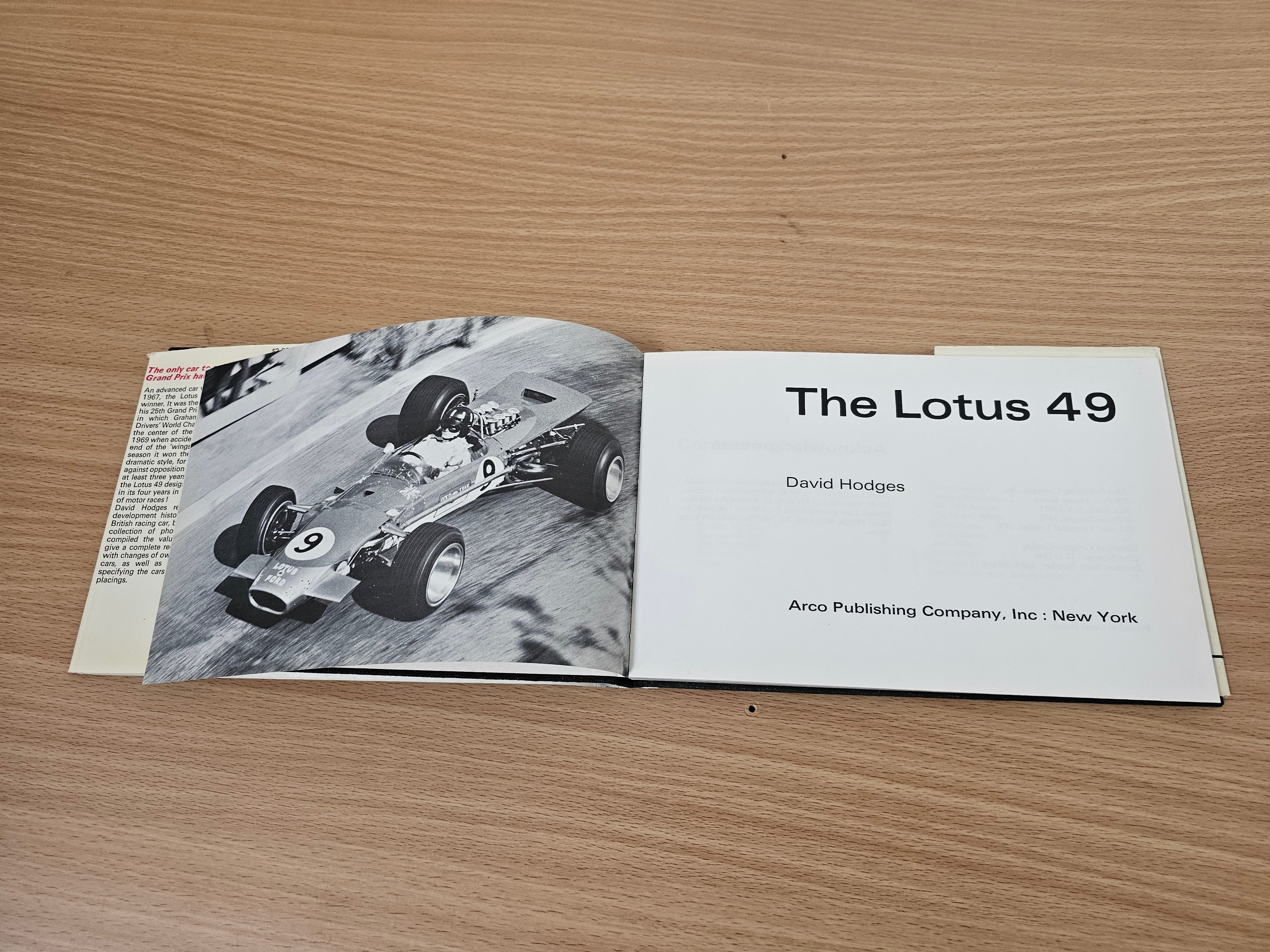 Open book: “The Lotus 49” title page with a black-and-white race car photo