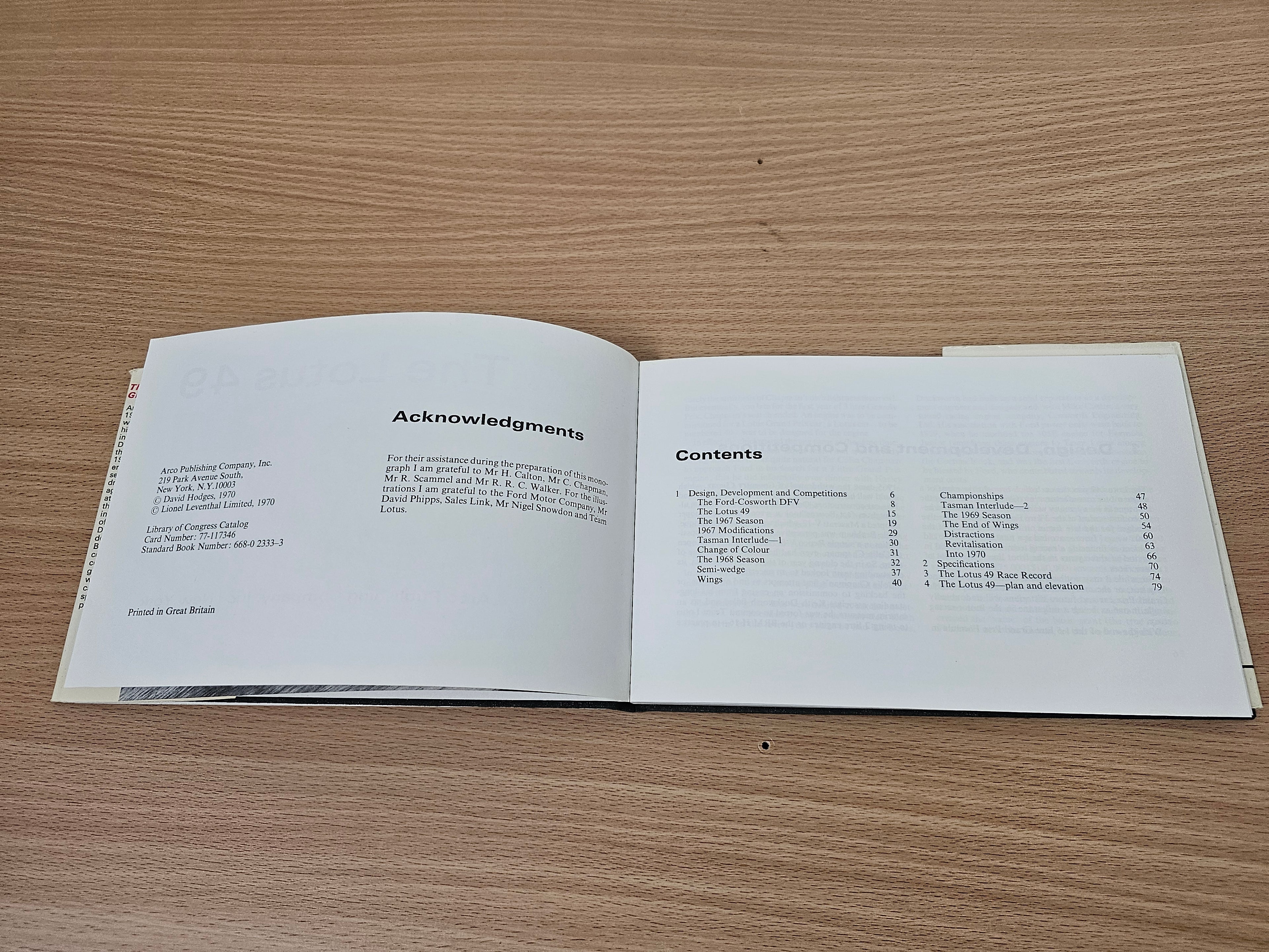 Open book spread showing acknowledgments page and contents list