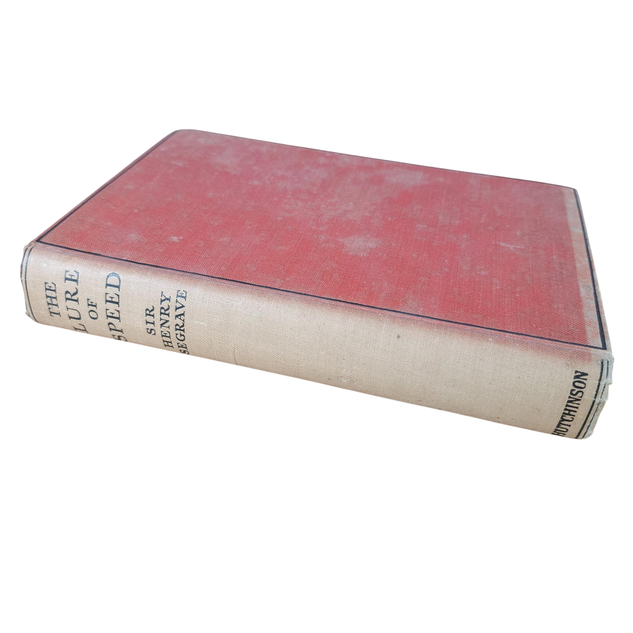 Red cloth vintage book with cream spine and title strip, slightly scuffed corners.