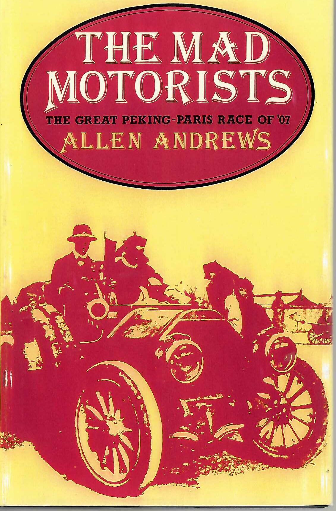 Vintage hardcover book with maroon oval title and horse-and-car race illustration on yellow cover