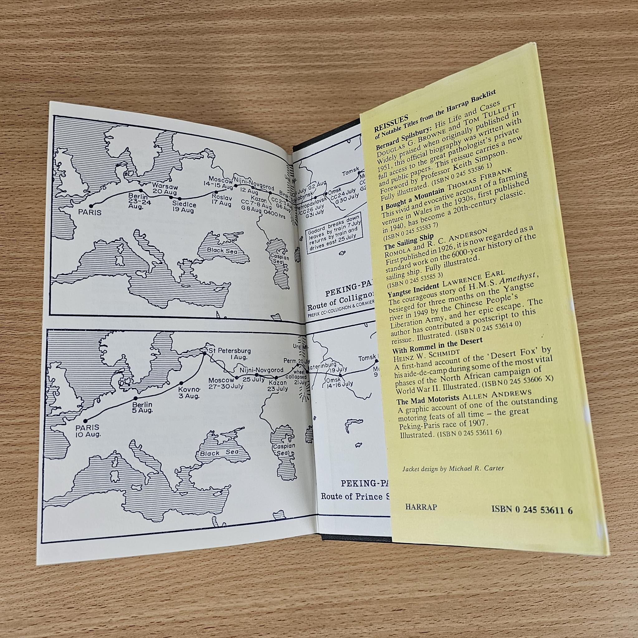 Open book with two route maps and a right-page text block on pale yellow paper