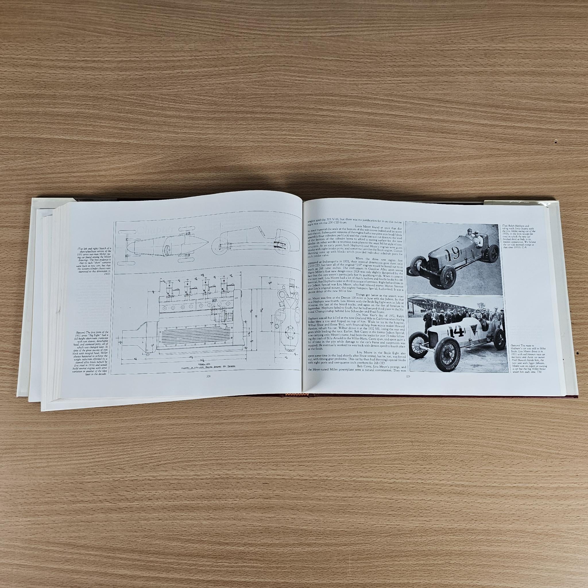 Open book spread featuring vehicle schematics and black-and-white photo pages