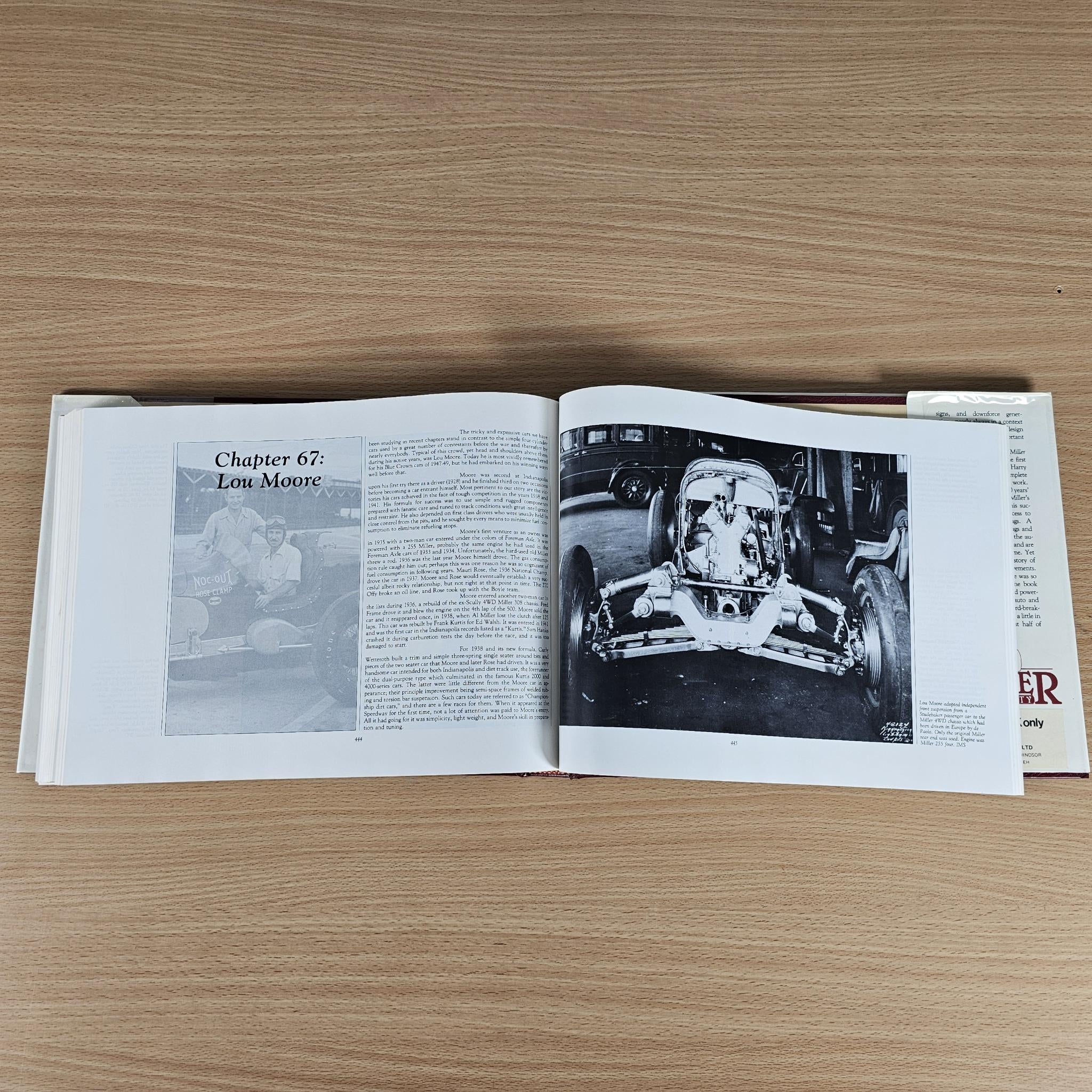 Open book spread with chapter heading and black-and-white engine photo