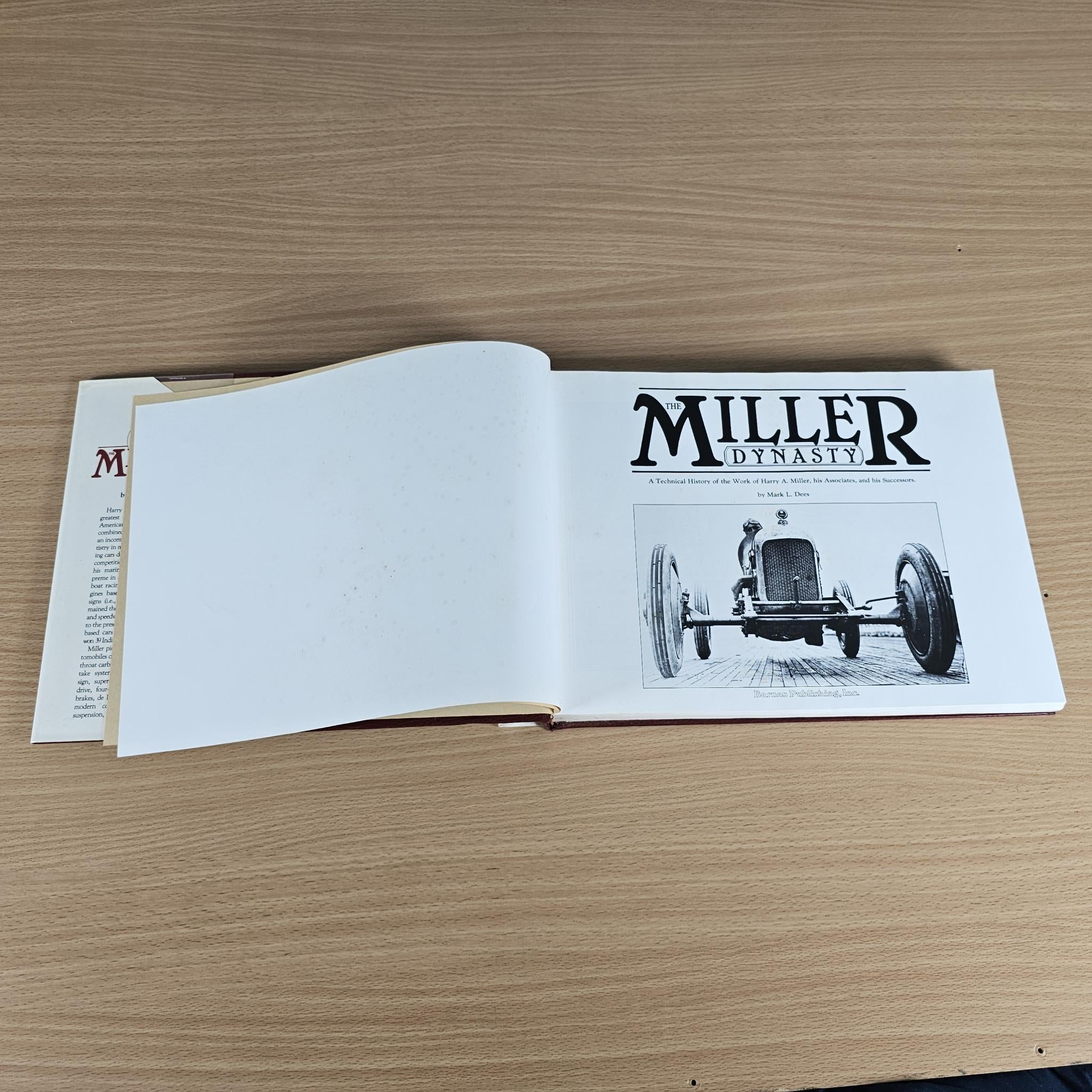 Miller Dynasty history book open to title page with vintage race car drawing